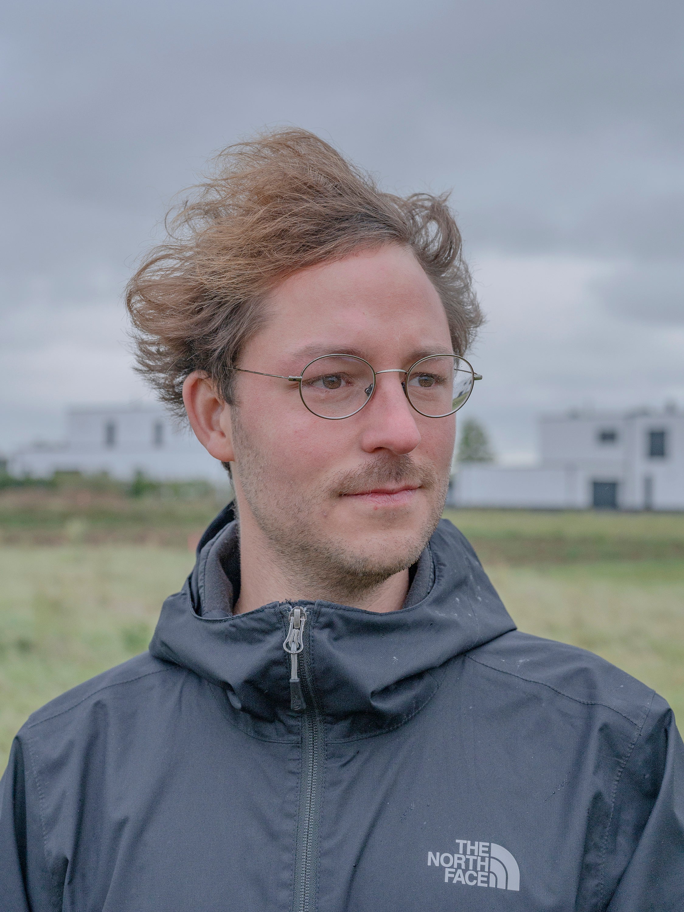 Tina Dresen’s brother David on the half-acre plot in New Kuckum that his family has been offered