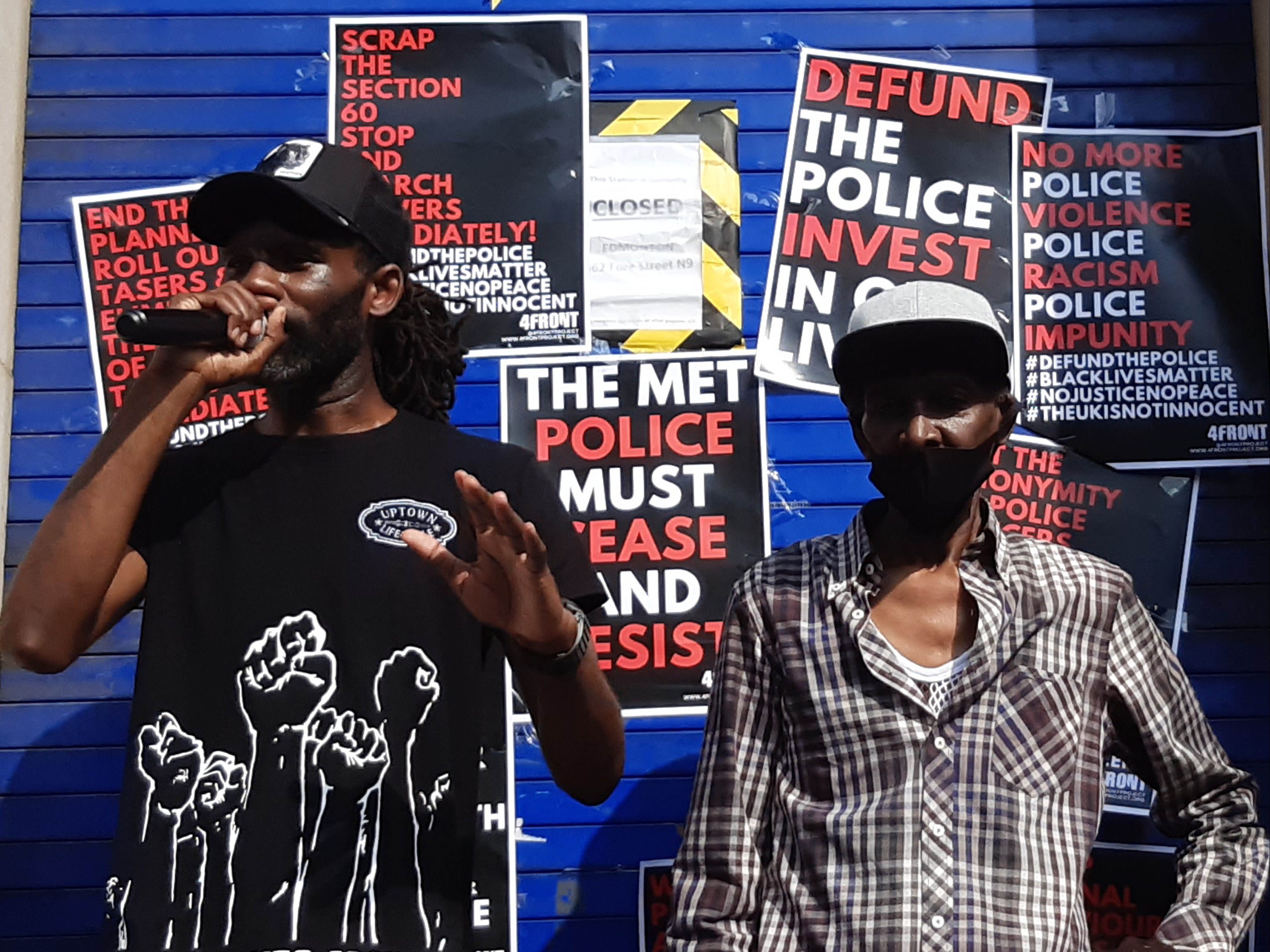 Rapper Wretch 32 (left) and his father Millard Scott, who was Tasered by police at his home in north London