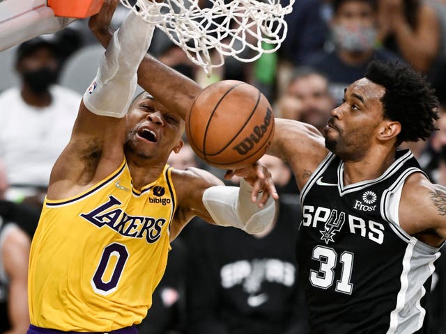 Los Angeles Lakers’ Russell Westbrook dunks against San Antonio Spurs’ Keita Bates-Diop (Darren Abate/AP)