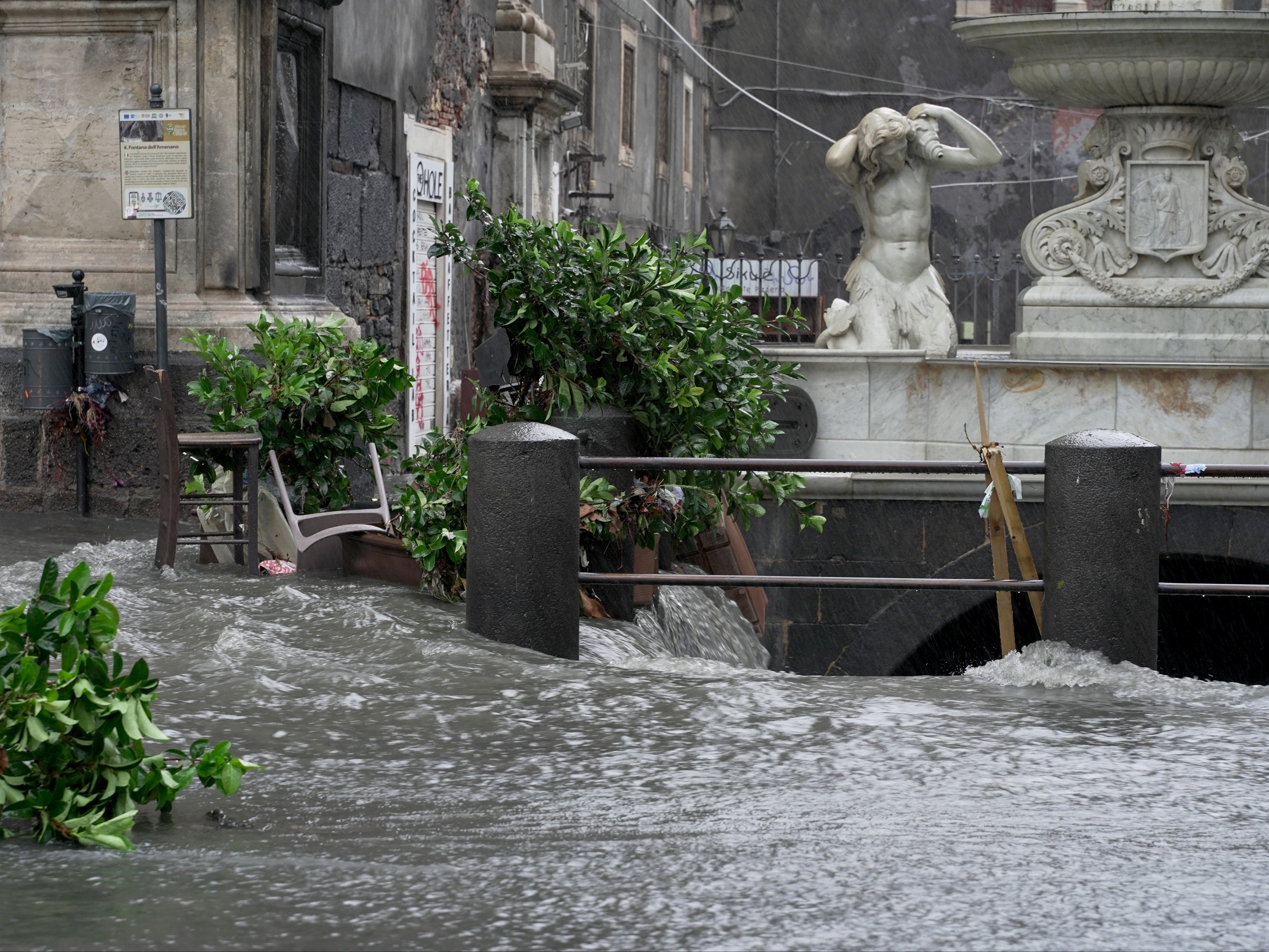 Streets are flooded during heavy rainfall in Catania