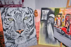 In Somalia, a rare female artist promotes images of peace 