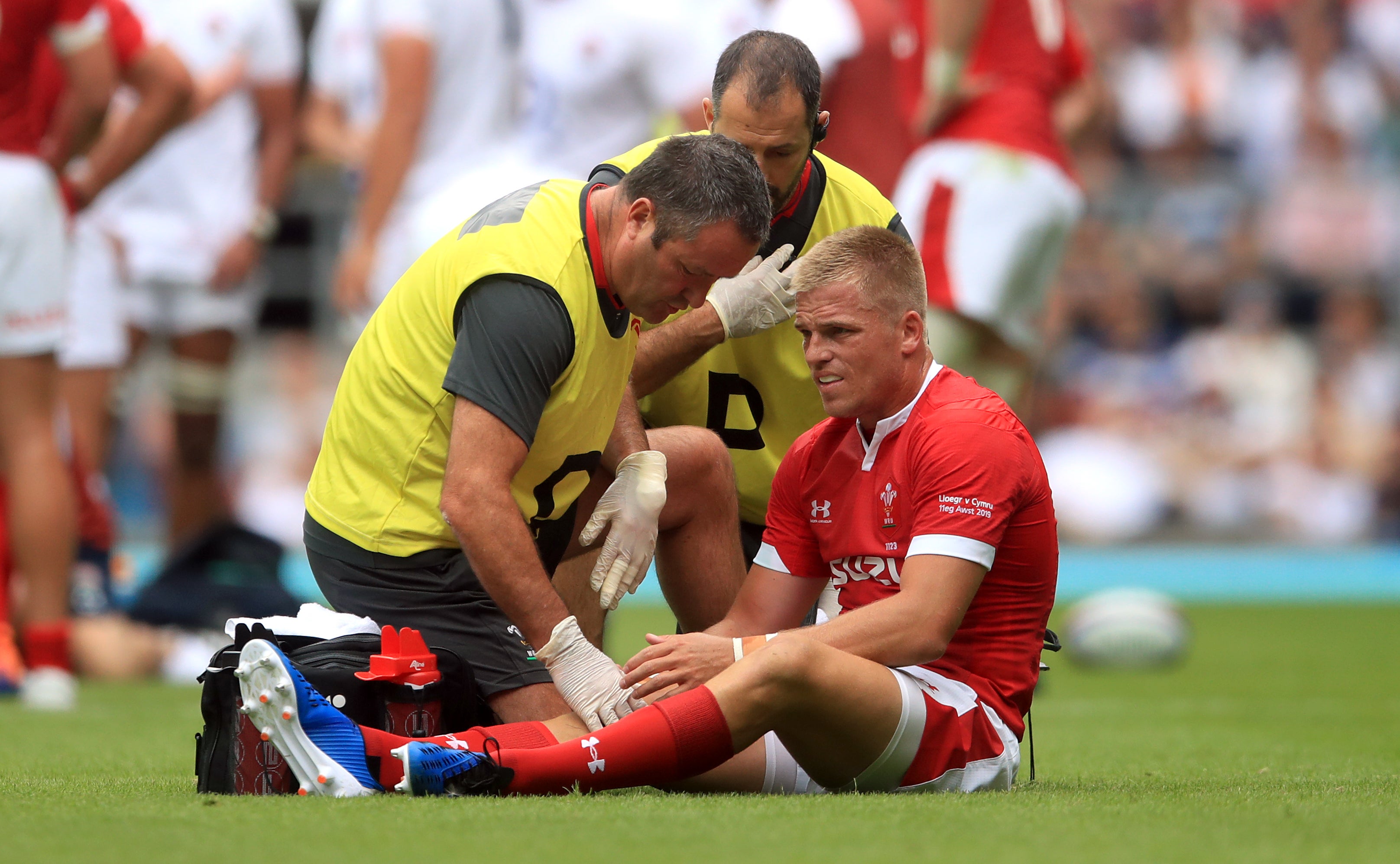 Anscombe receives treatment during Wales’ 2019 World Cup warm-up game against England (Adam Davy/PA)