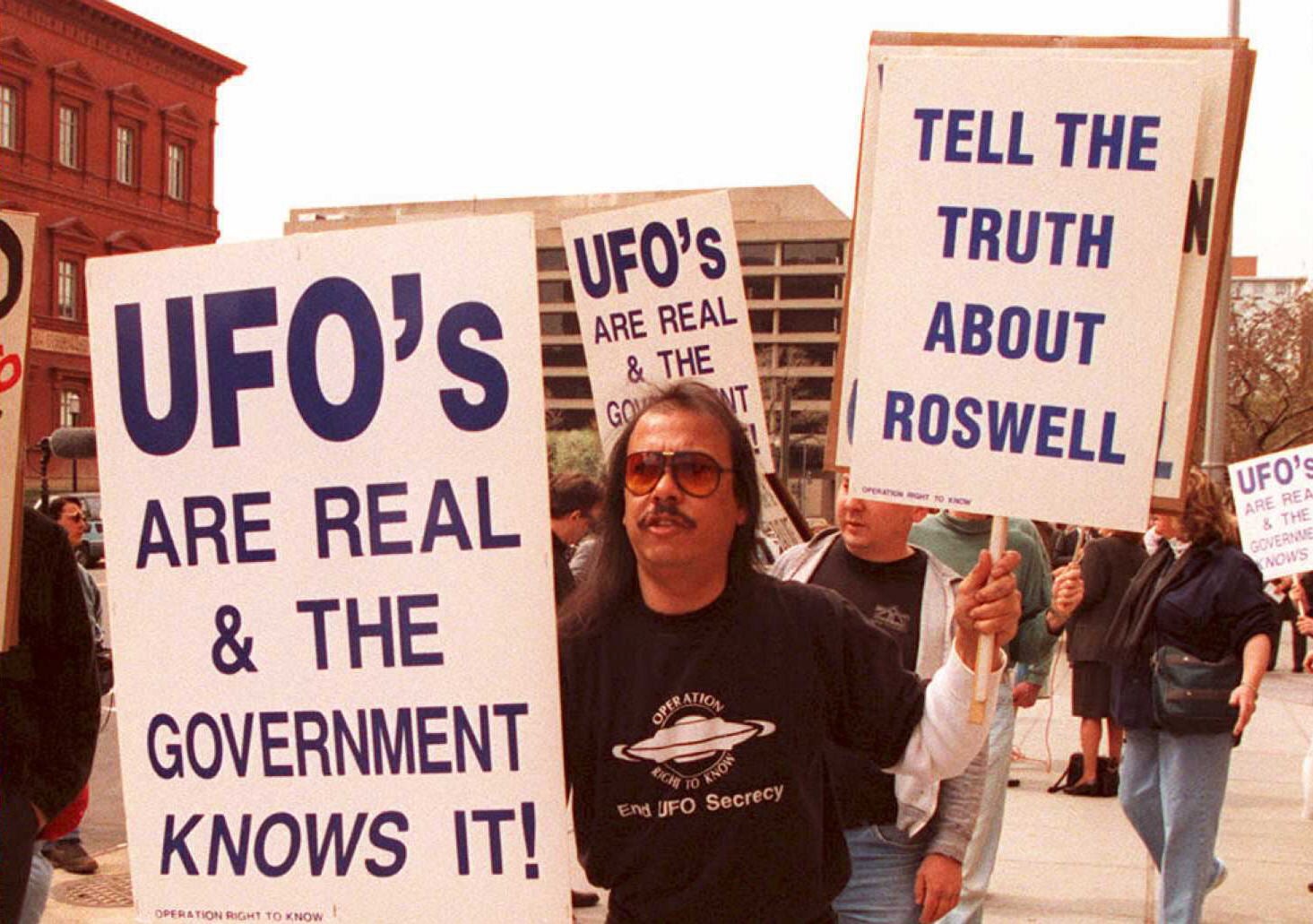 Suspicions about a government cover-up of UFOs goes back decades, including this march in Washington DC in 1995