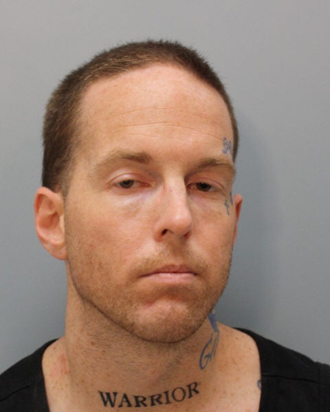 Brian Coulter is pictured in his mugshot following his arrest for the murder of the eight-year-old son of his girlfriend