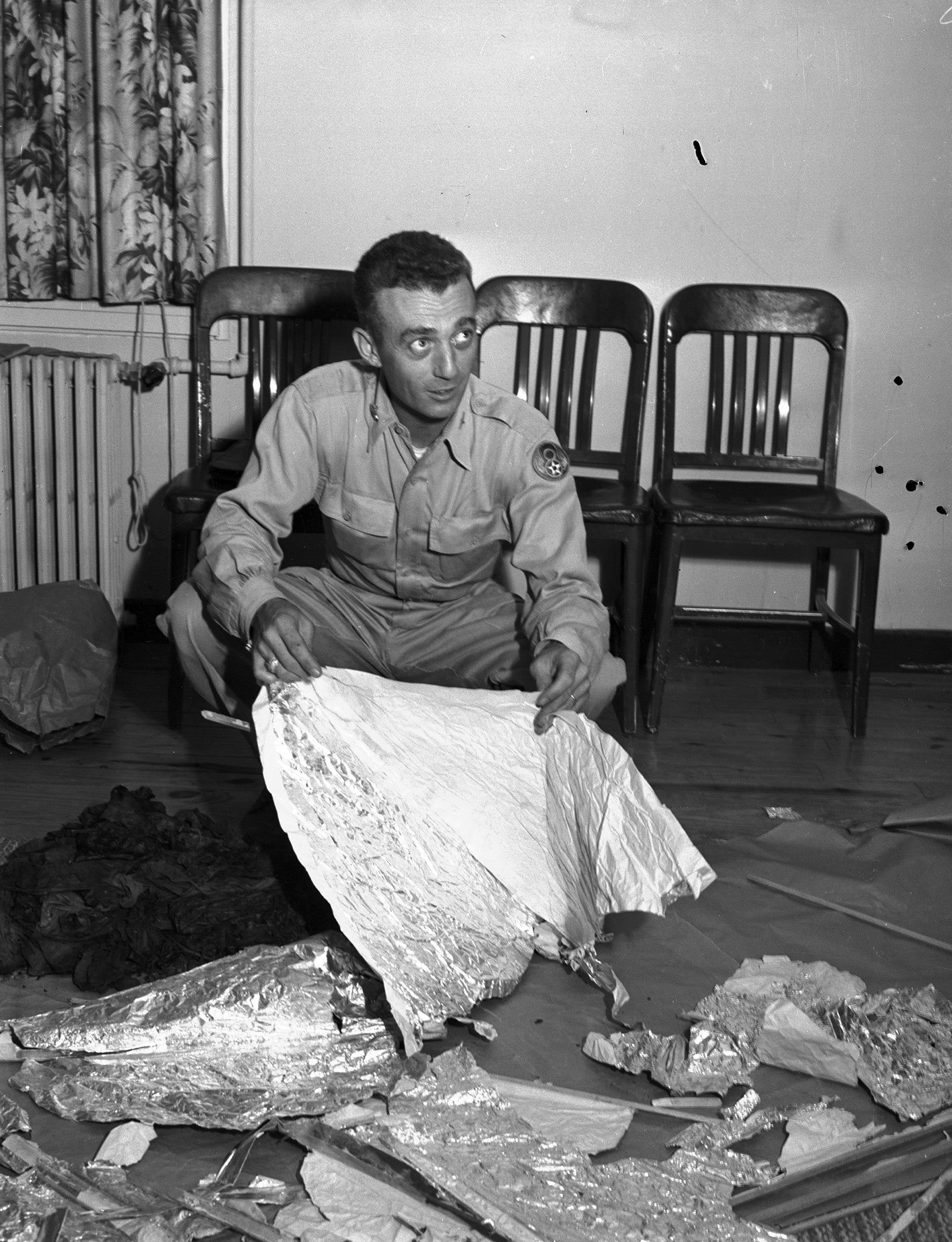 ‘We have this crashed UFO debris right here’: Marcel holding foil debris from Roswell