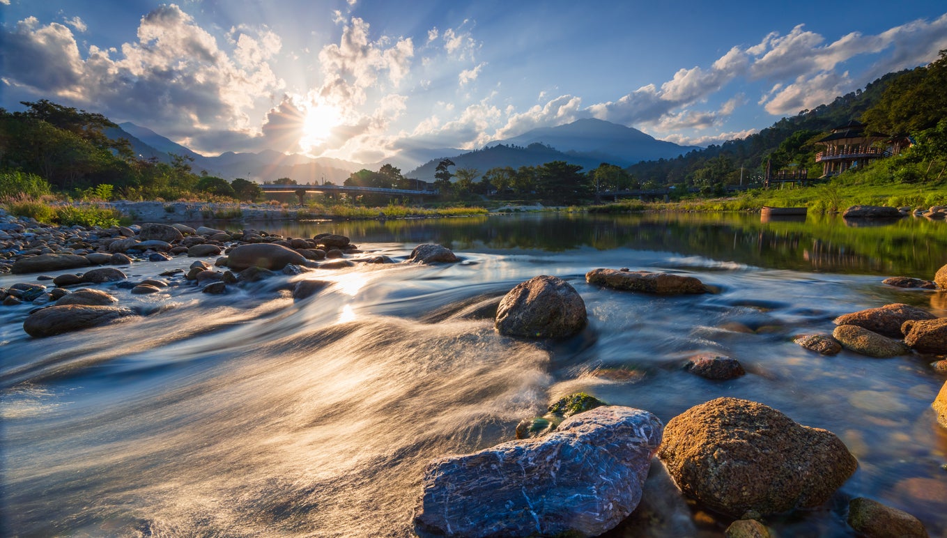 The sun sets over the river at Kiriwong village, Nakhon Si Thammarat