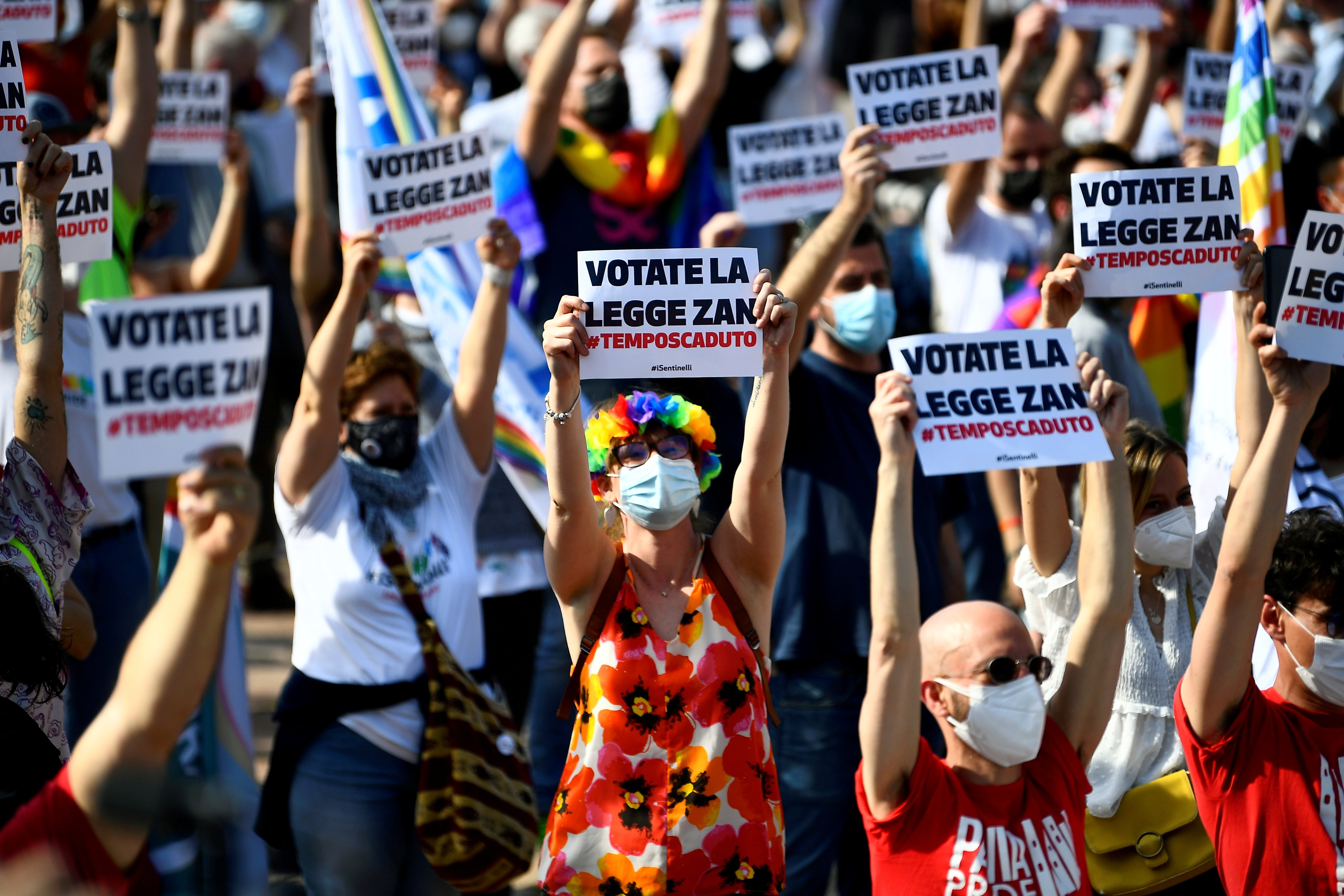 People gather for a protest in support of a proposed anti-discrimination bill that makes violence against LGBT+ people a hate crime in Milan earlier this year