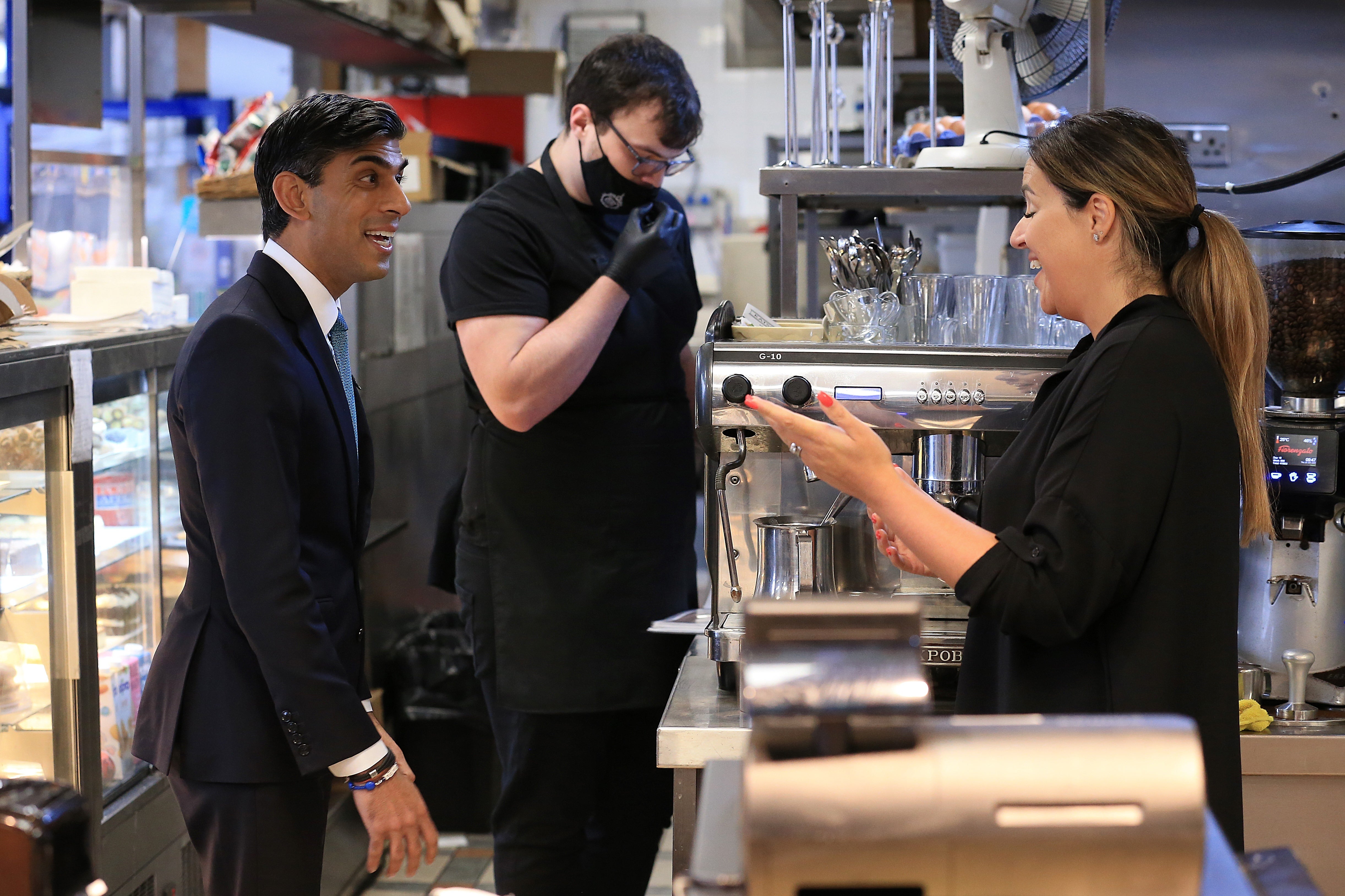 The Chancellor conducted his broadcast interviews in Bury market on Thursday (Lindsey Parnaby/PA)