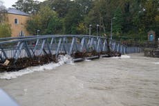 Floods swamp bridges in Scotland as UK to be hit with five more days of rain