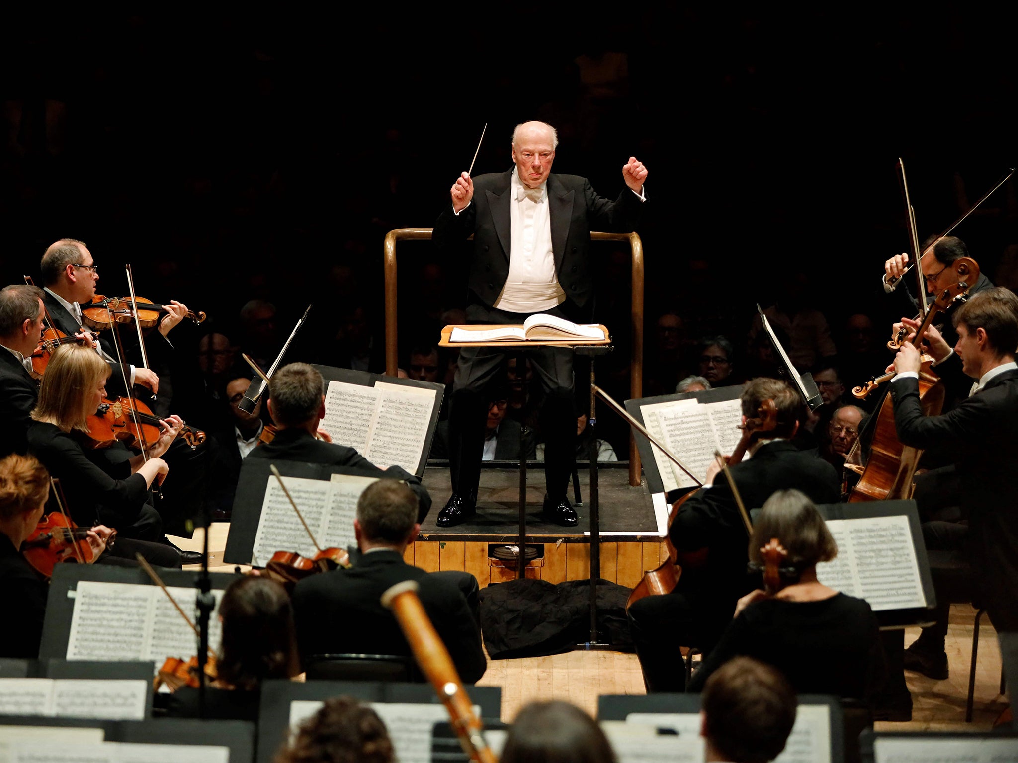 Dutch conductor Bernard Haitink conducts the London Symphony Orchestra during a concert celebrating the conductor's 90th birthday at The Barbican in London