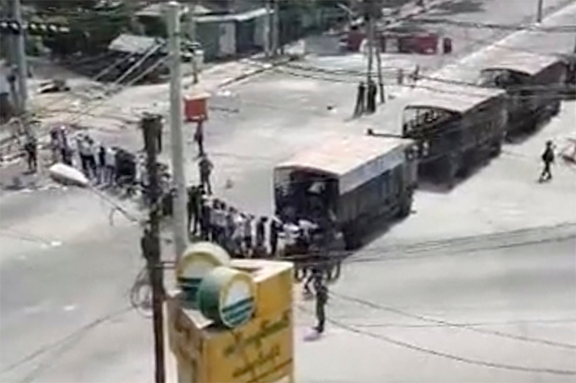 Soldiers line up arrested protesters in Yangon, Myanmar on 3 March 2021