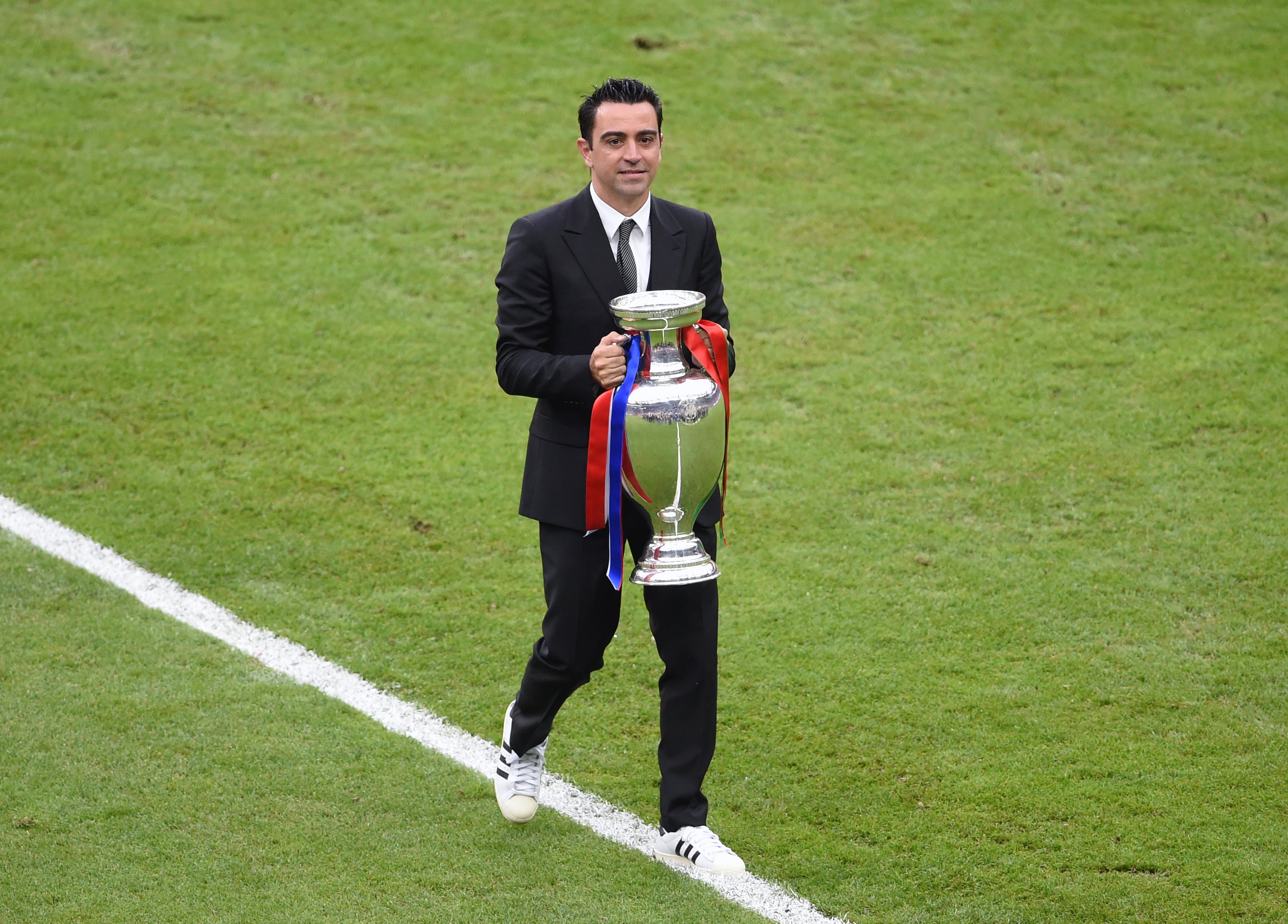 Xavi has been linked with a return to Barcelona (Joe Giddens/PA)