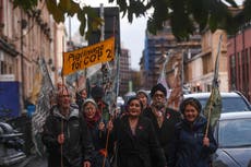 Pilgrims arrive in Glasgow to call for climate action after walking thousands of miles for Cop26