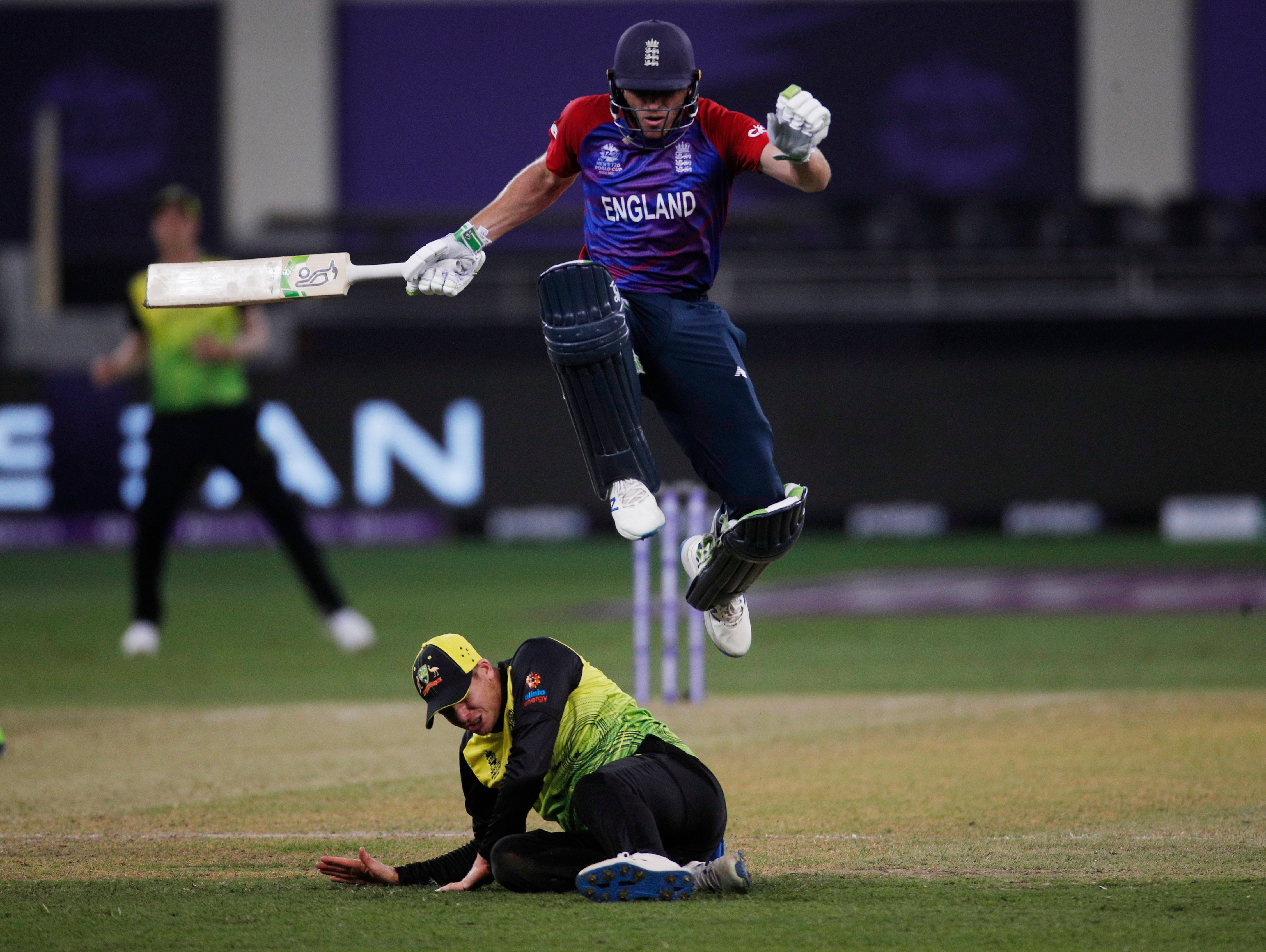 Jos Buttler hurdles Steve Smith