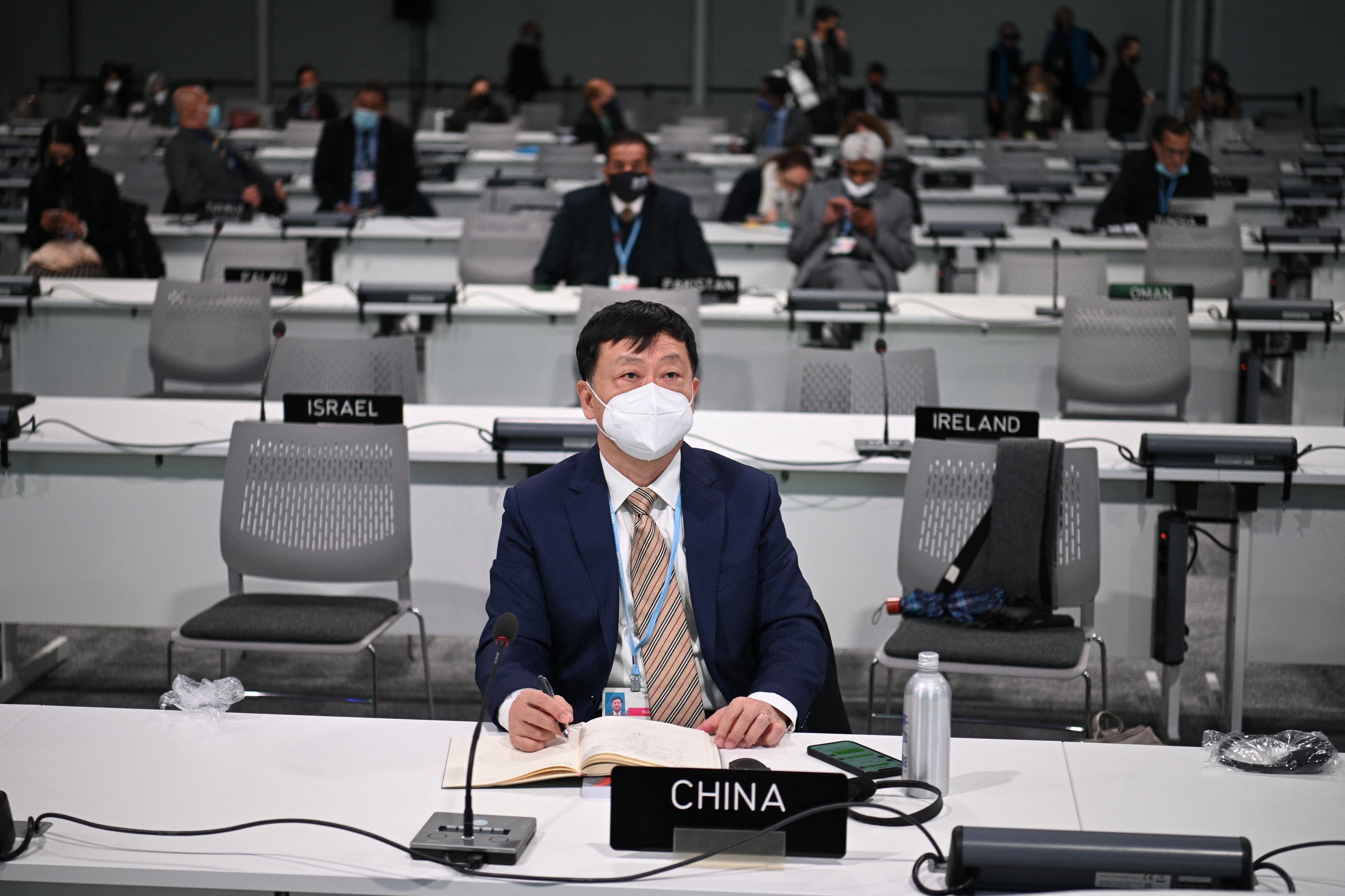 Delegates attend the First Plenary Meeting of the conference