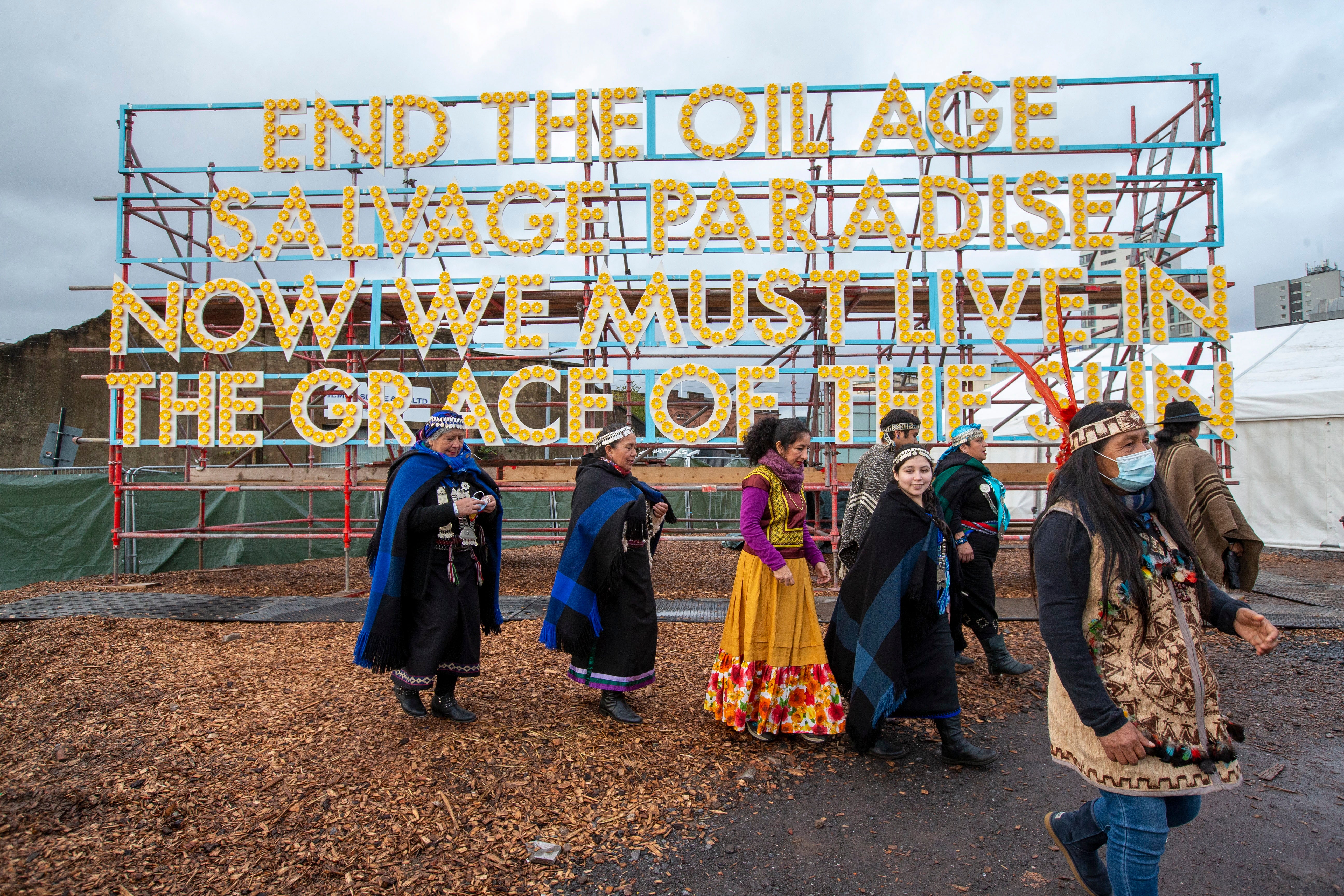Indigenous activists Minga Indigena from the Andes and the Amazonian forest, Alaska and southern Patagonia outside the Cop 26 conference in Glasgow