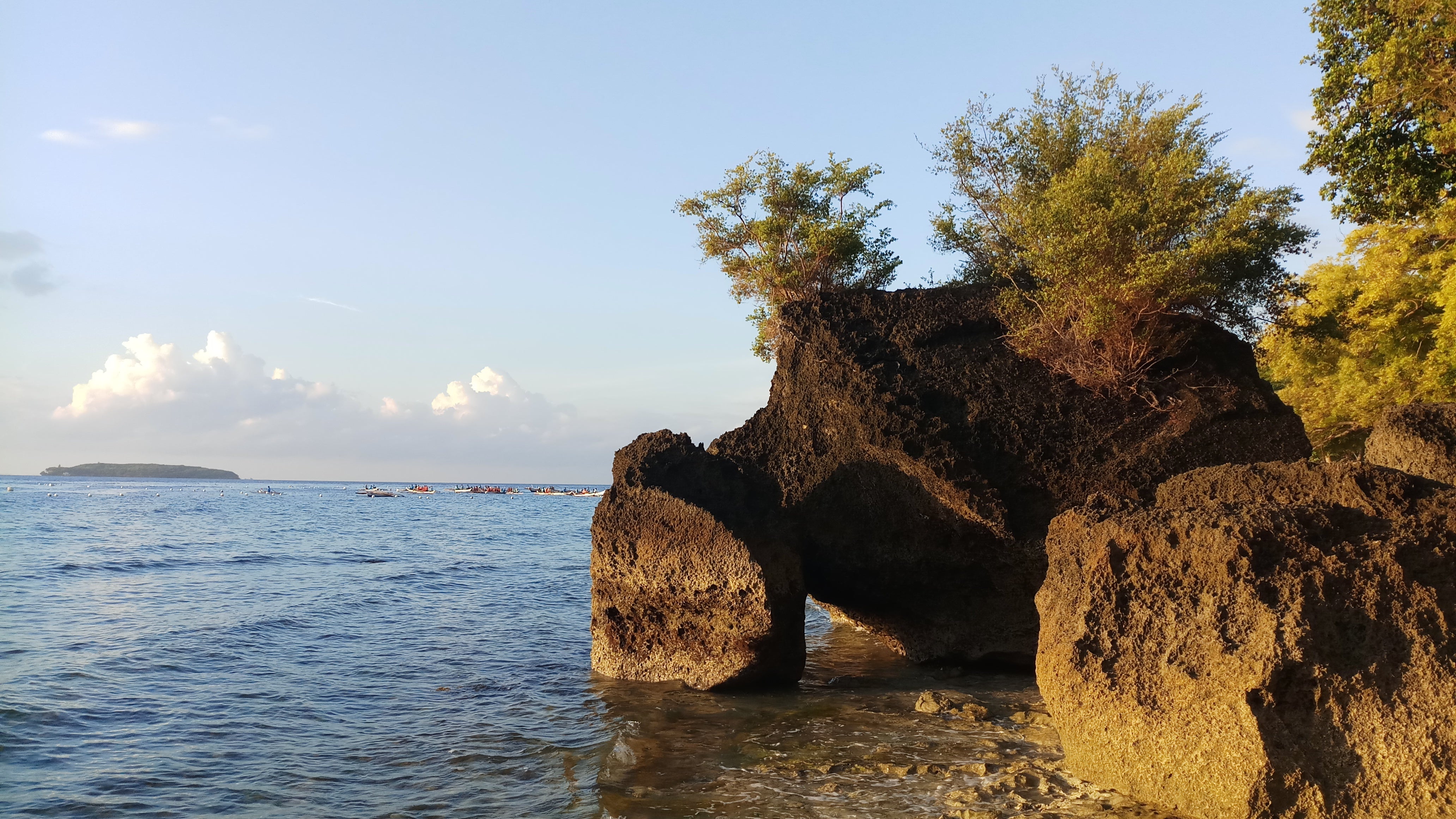 Limestone boulders dot the mountainous terrain of Oslob facing the Cebu Strait, Tan-Awan