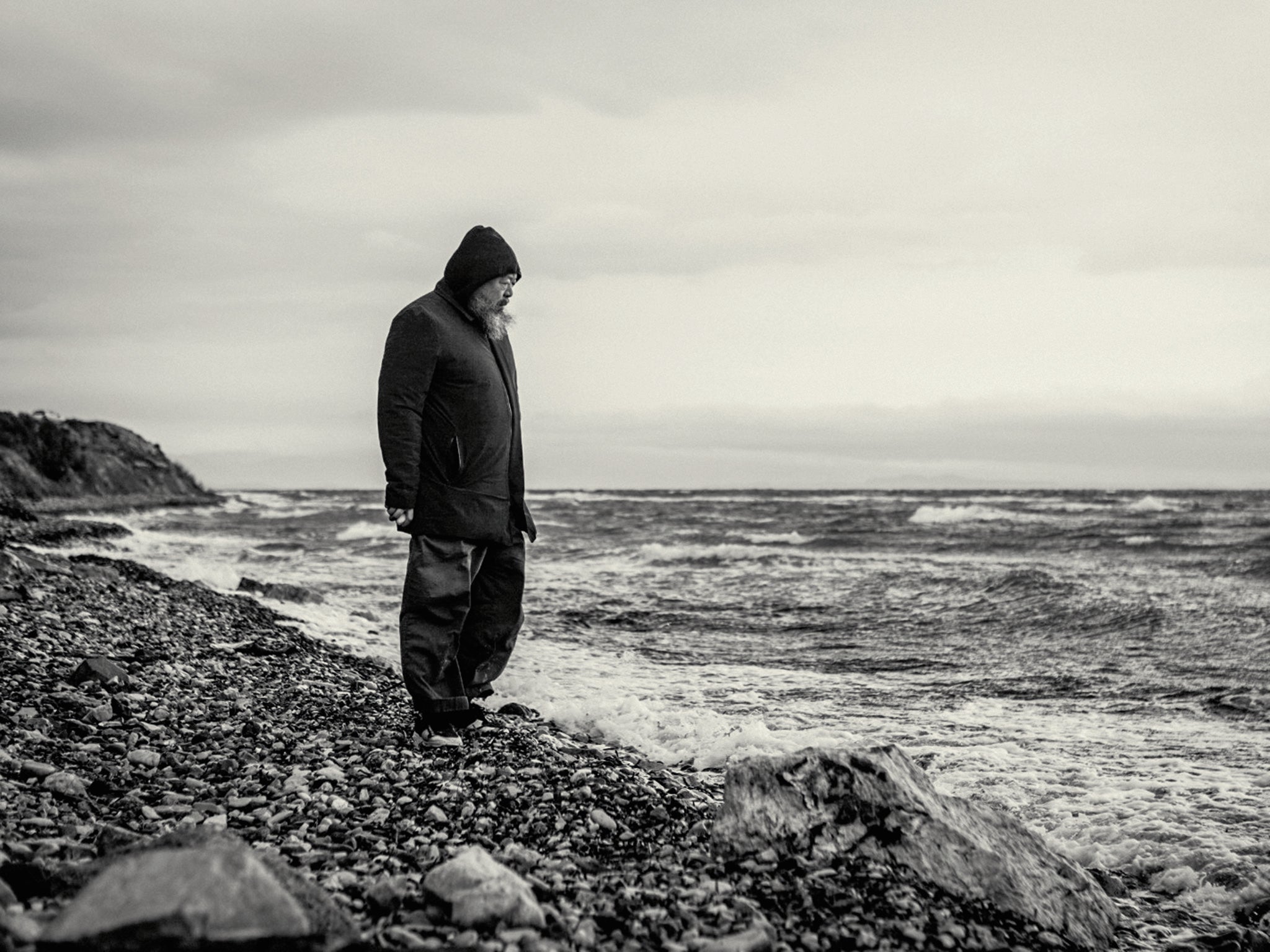 The activist on the shore of Lesbos in 2016, where he set up a studio to highlight the plight of refugees