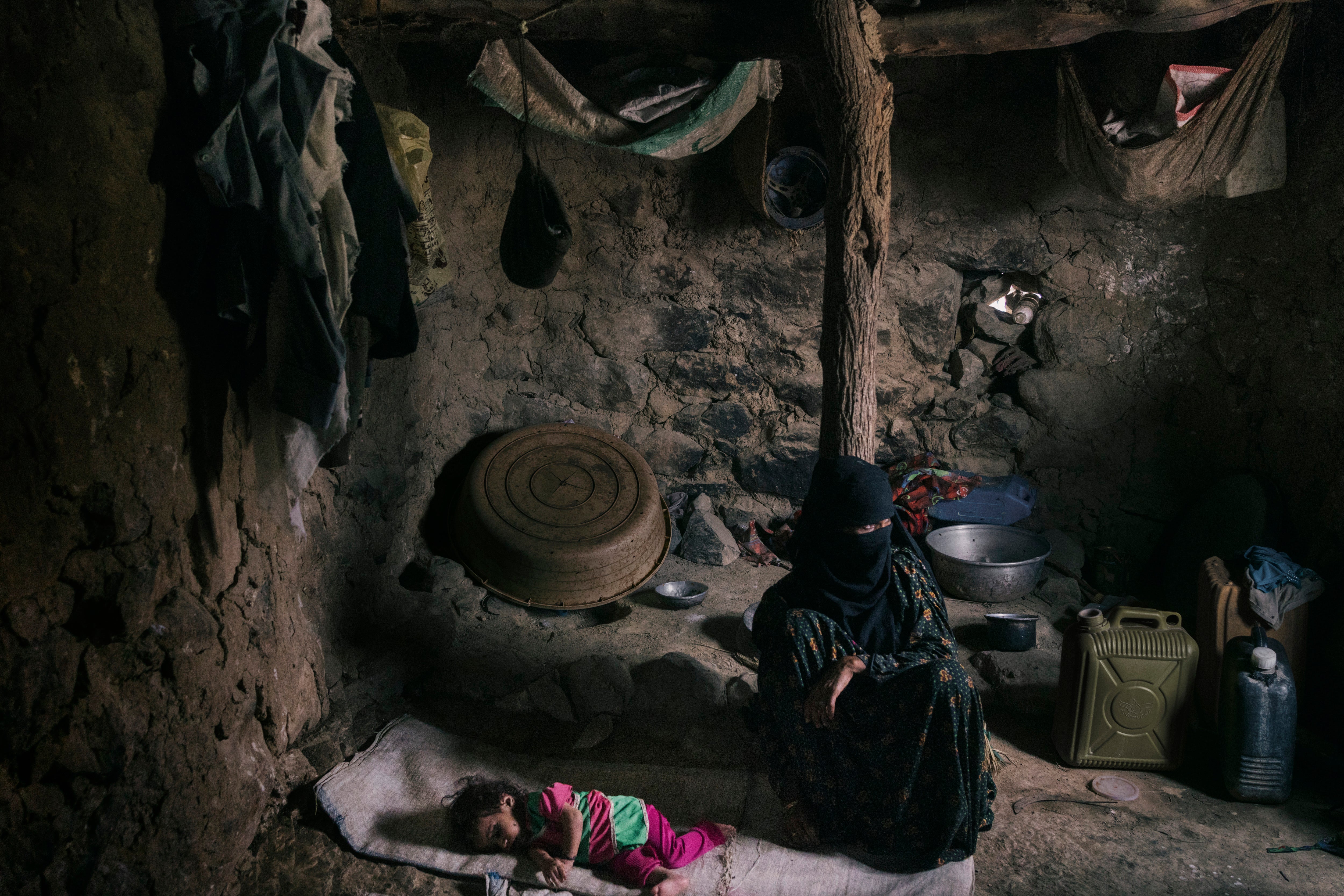 Bushra tends to her daughter