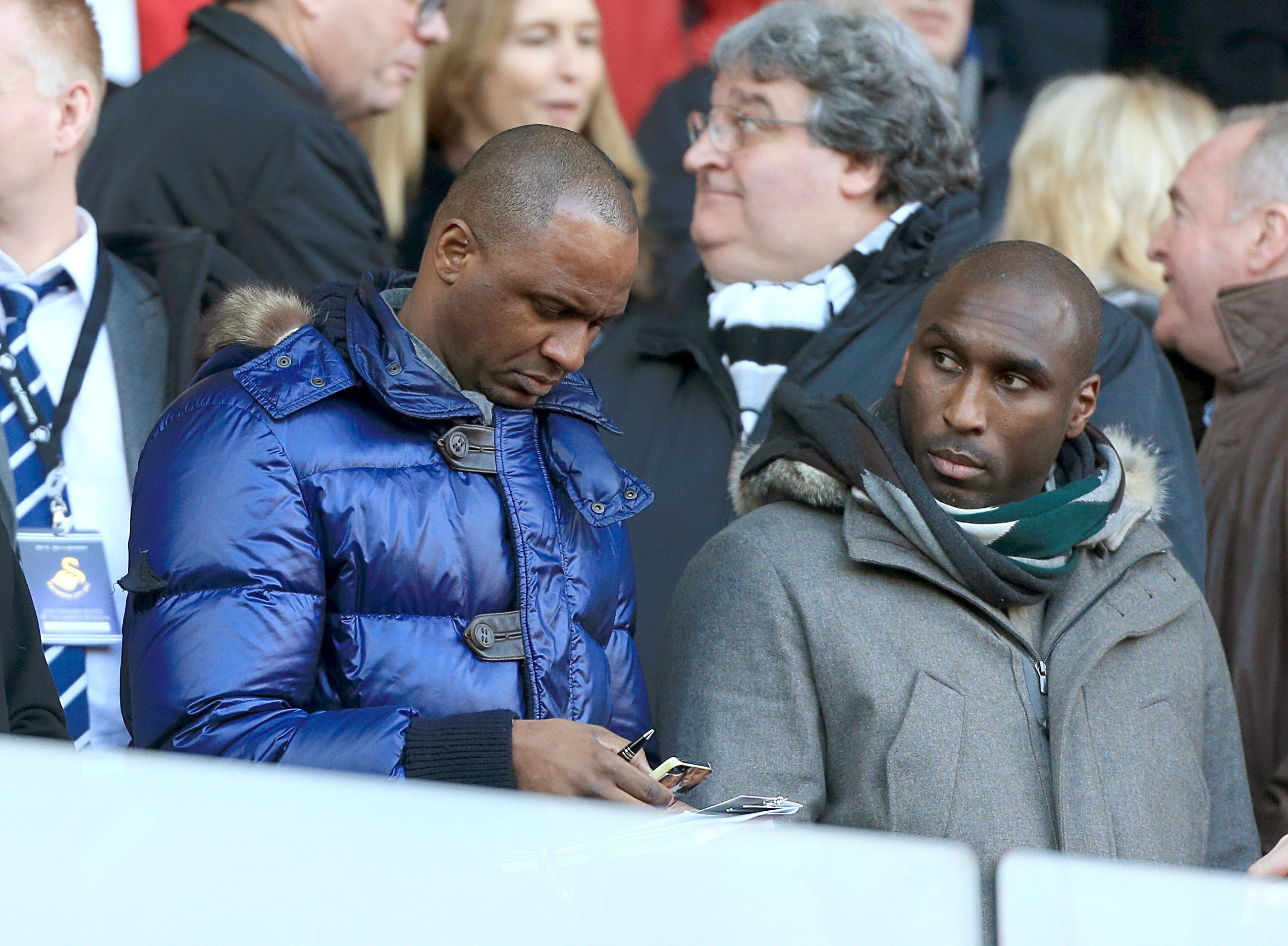 Sol Campbell (right) plans to learn from Patrick Vieira (Nick Potts/PA)