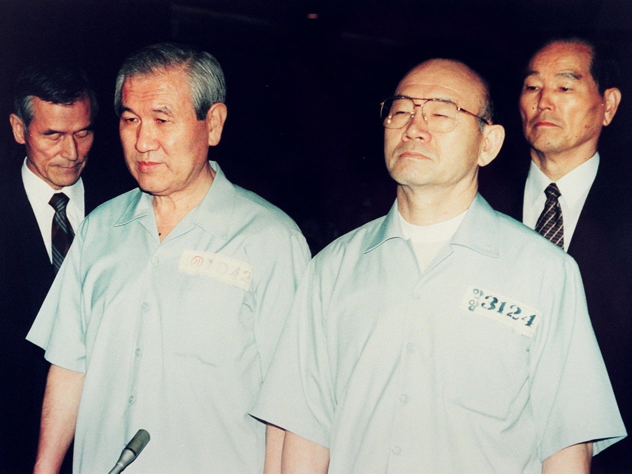 Roh and Chun Doo-hwan on trial for numerous counts of insurgency, graft and murder in 1996