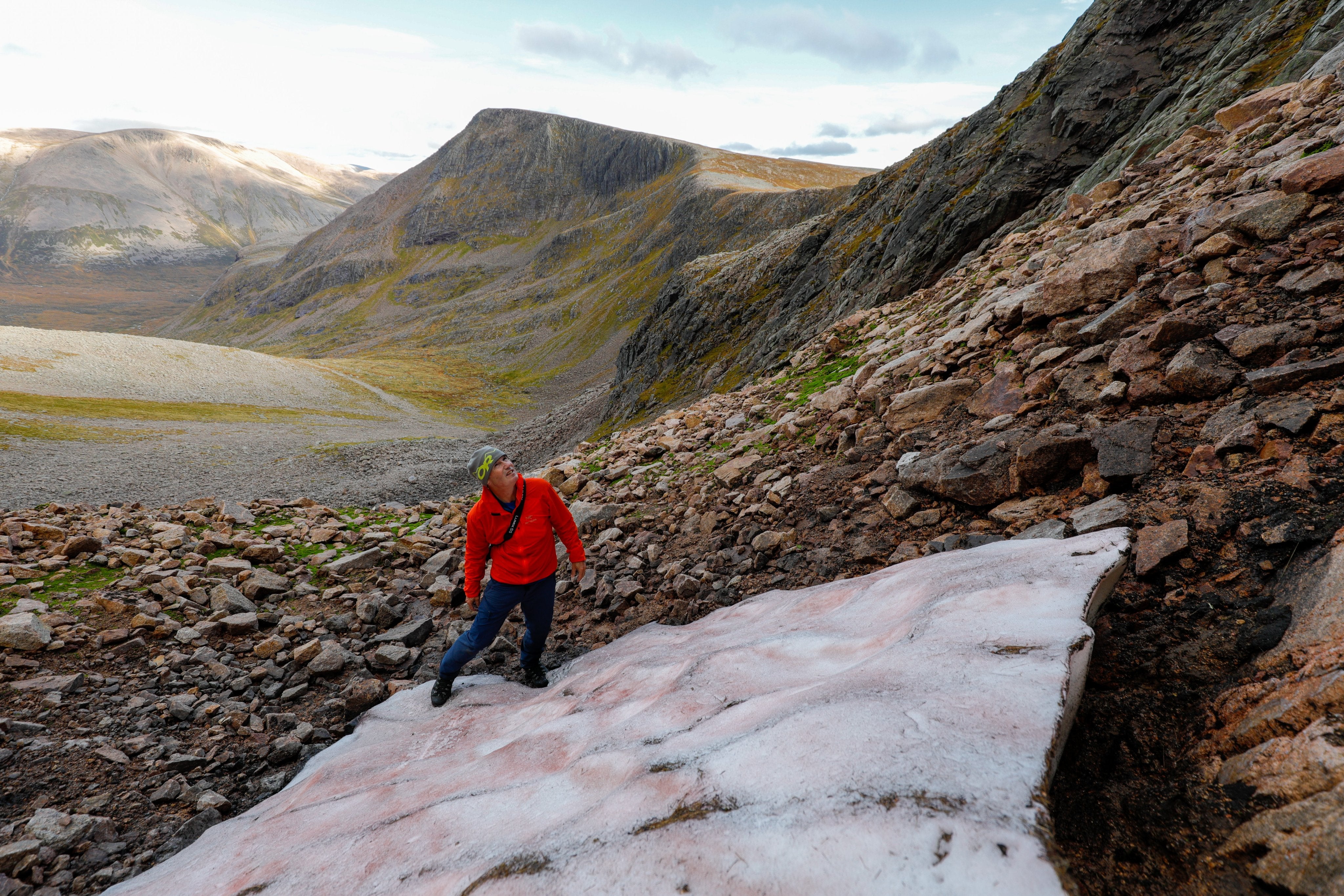 Iain Cameron has dedicated his life to studying snow patches. Here he stands with the Sphinx, the UK’s most durable patch of snow.