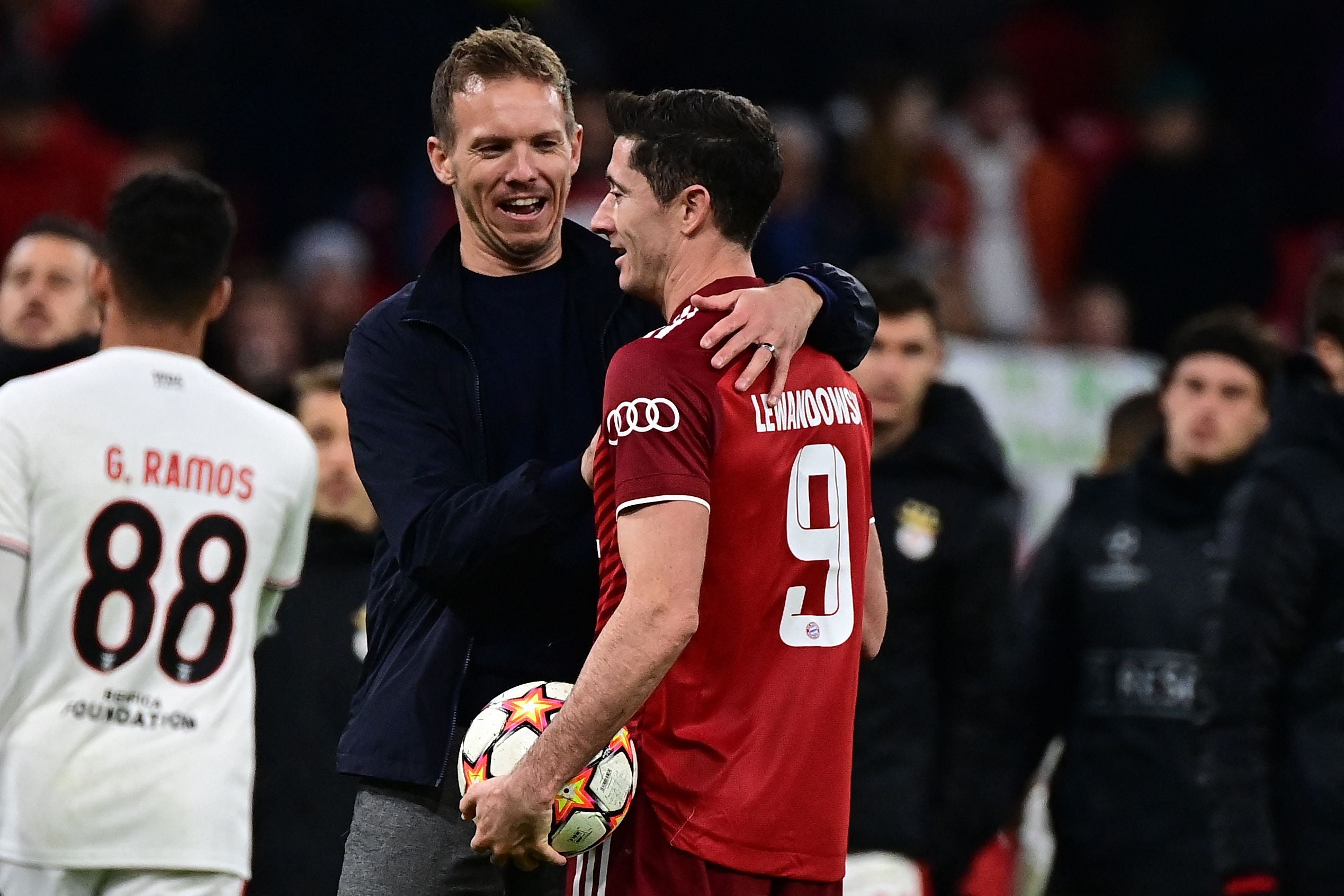 Bayern manager Julian Nagelsmann hugs striker Robert Lewandowski