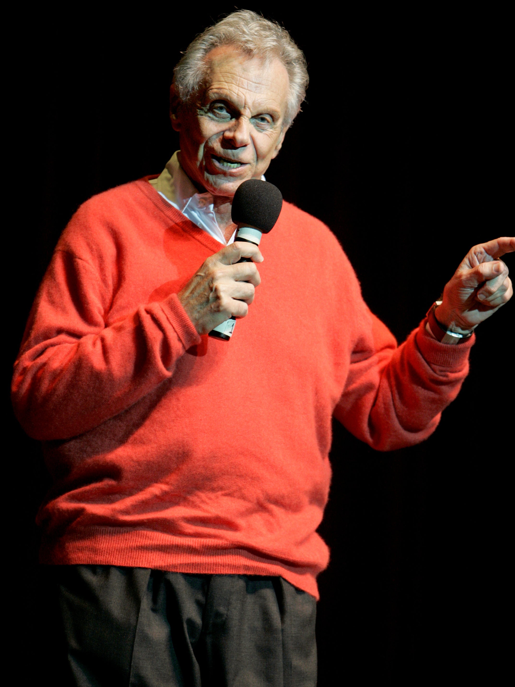 Performing at a stand-up gig to celebrate his 80th birthday in 2007