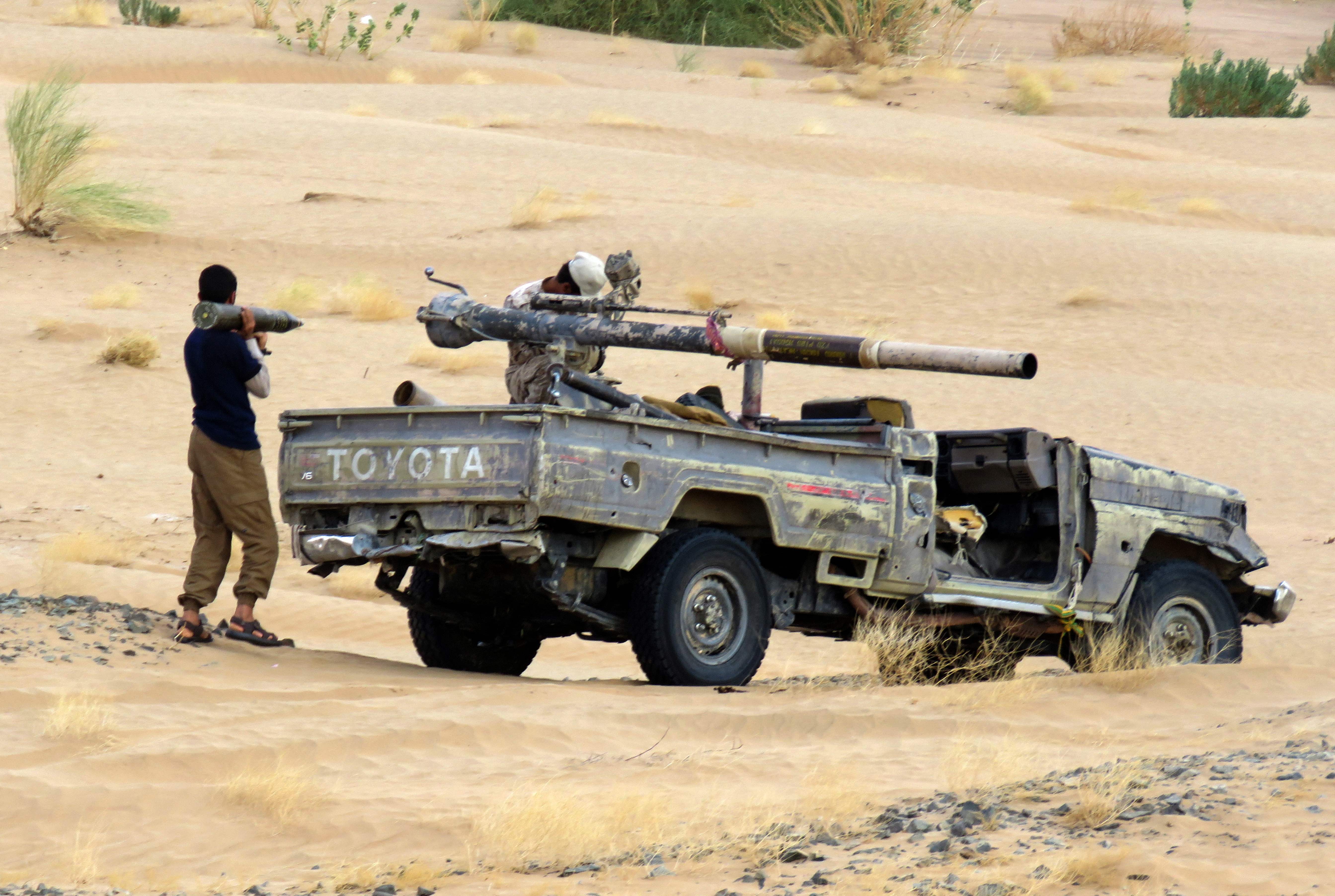 Sighters loyal to Yemen's Saudi-backed government man a position near al-Jawba frontline facing Iran-backed Huthi rebels, in the country's northeastern province of Marib