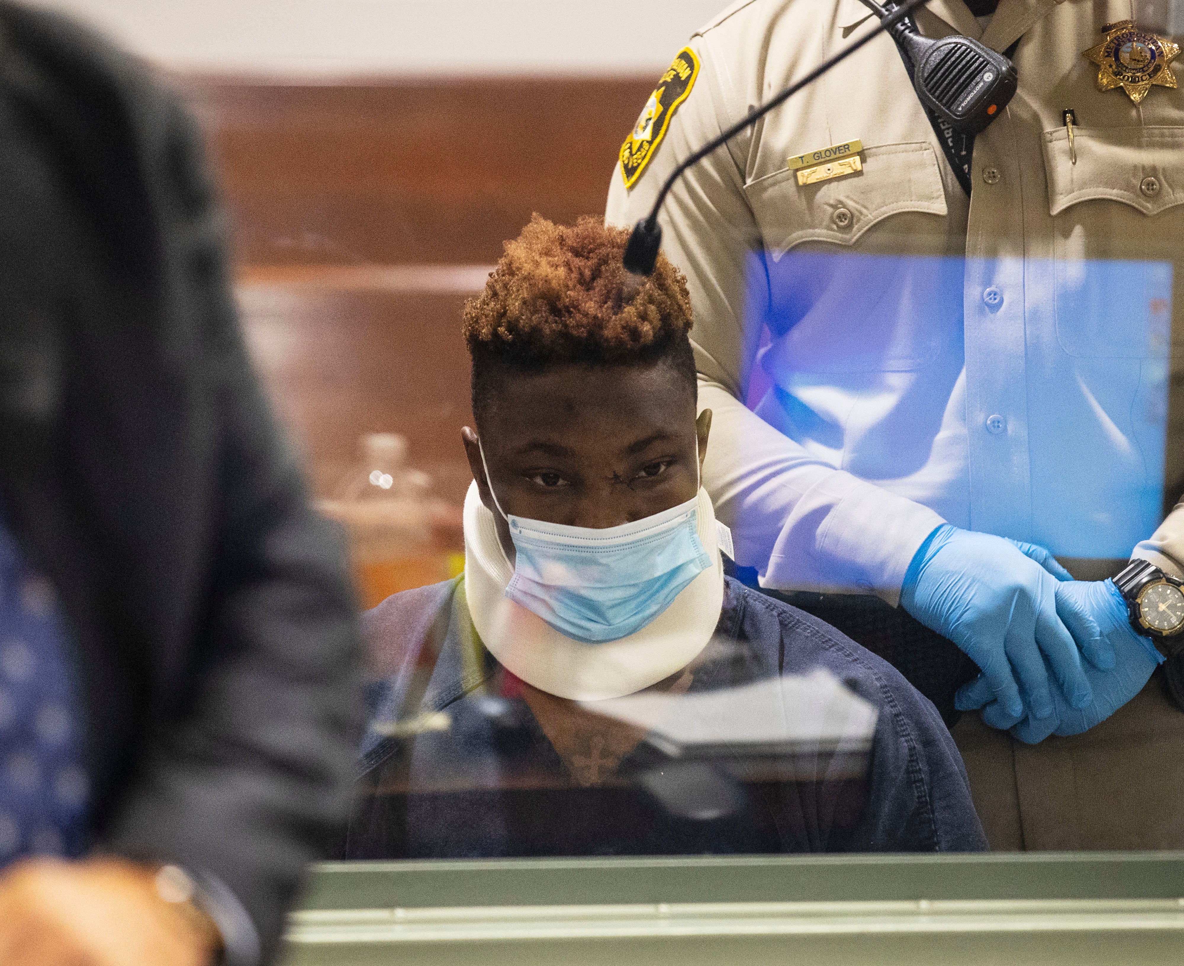 Former Raiders wide receiver Henry Ruggs, accused of DUI resulting in death, appears in court during his initial arraignment at the Regional Justice Center, on Wednesday, Nov. 3, 2021, in Las Vegas.