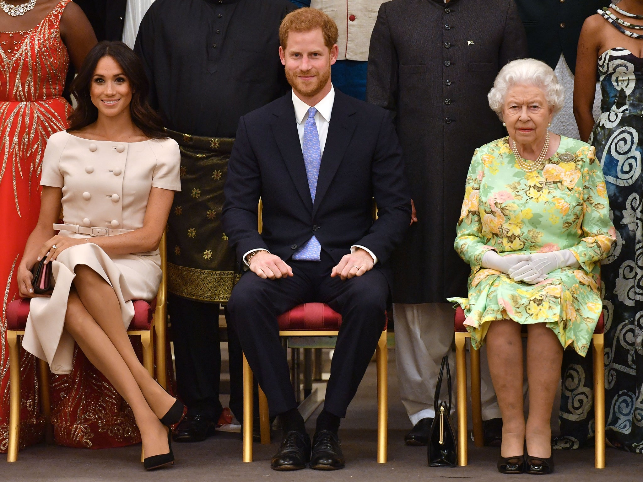 Meghan, Harry and the Queen at the Queen’s Young Leaders Awards Ceremony at Buckingham Palace on June 26, 2018