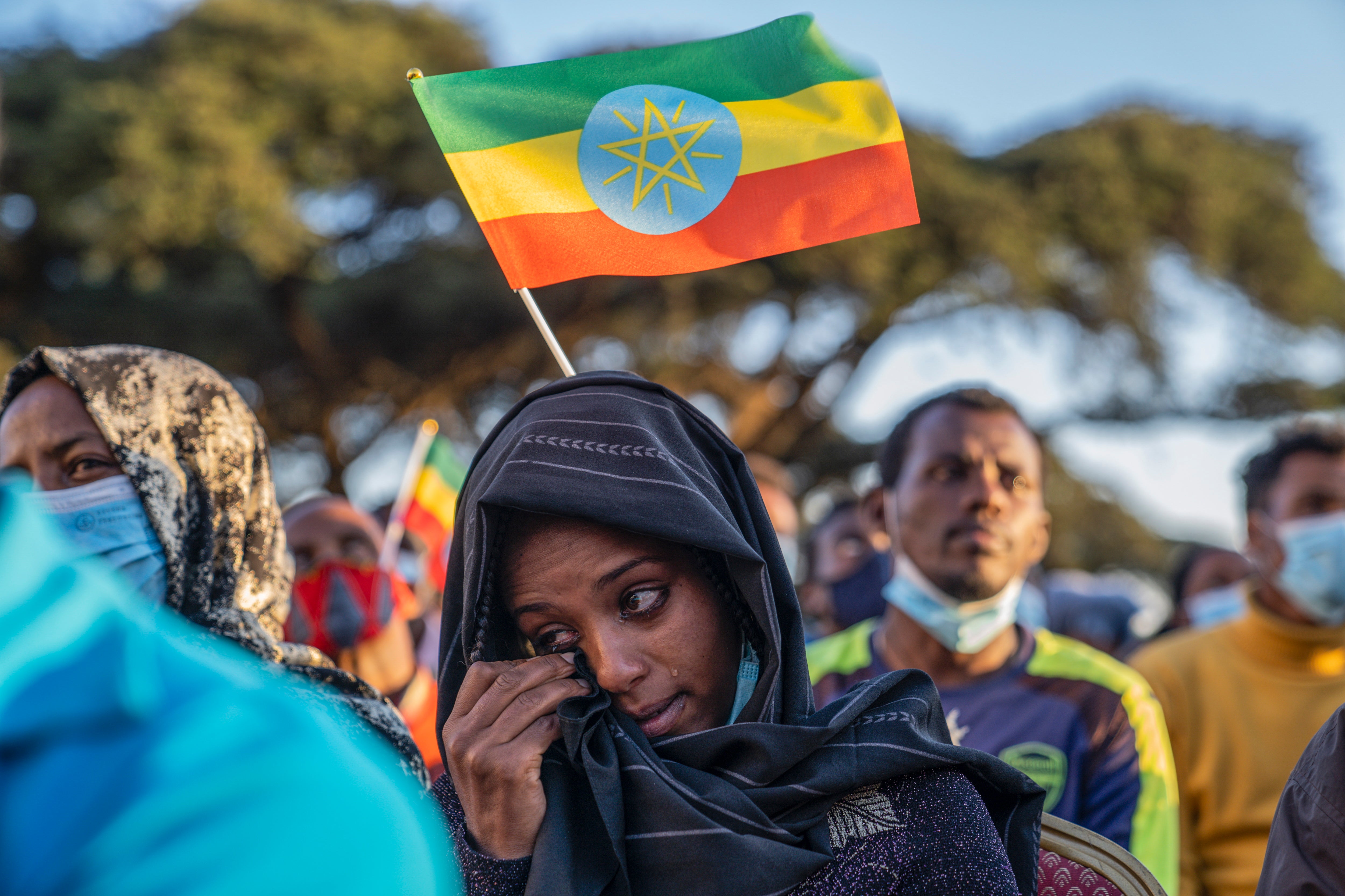 An Ethiopian woman weeps during an event marking the first anniversary of the war in Tigray