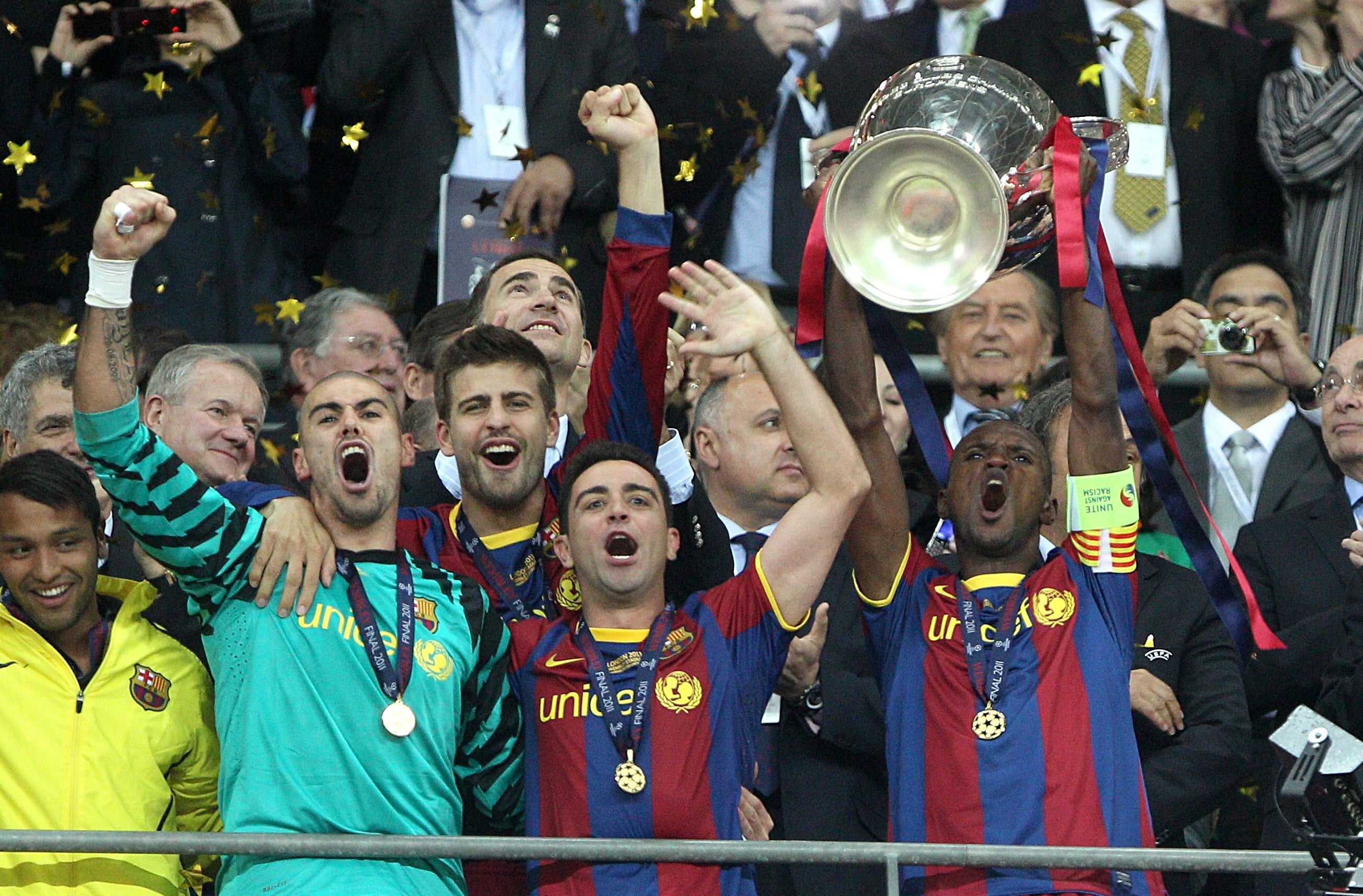 Xavi (centre) won 25 trophies in his 17 years as a Barcelona first-team player (Nick Potts/PA)