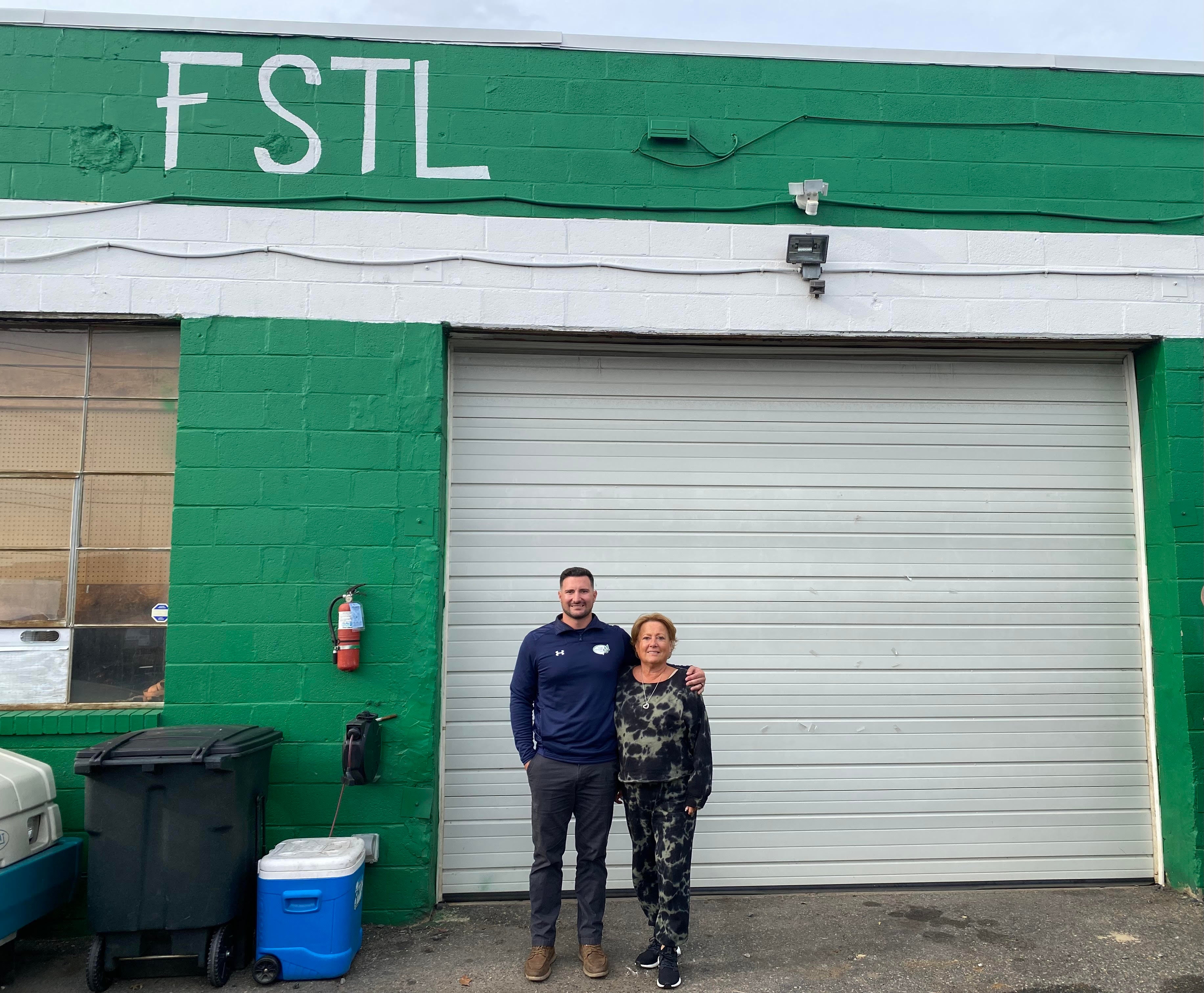 Marie Sivaro, the owners of Four Seasons Total Landscaping, and her son Michael, director of operations.