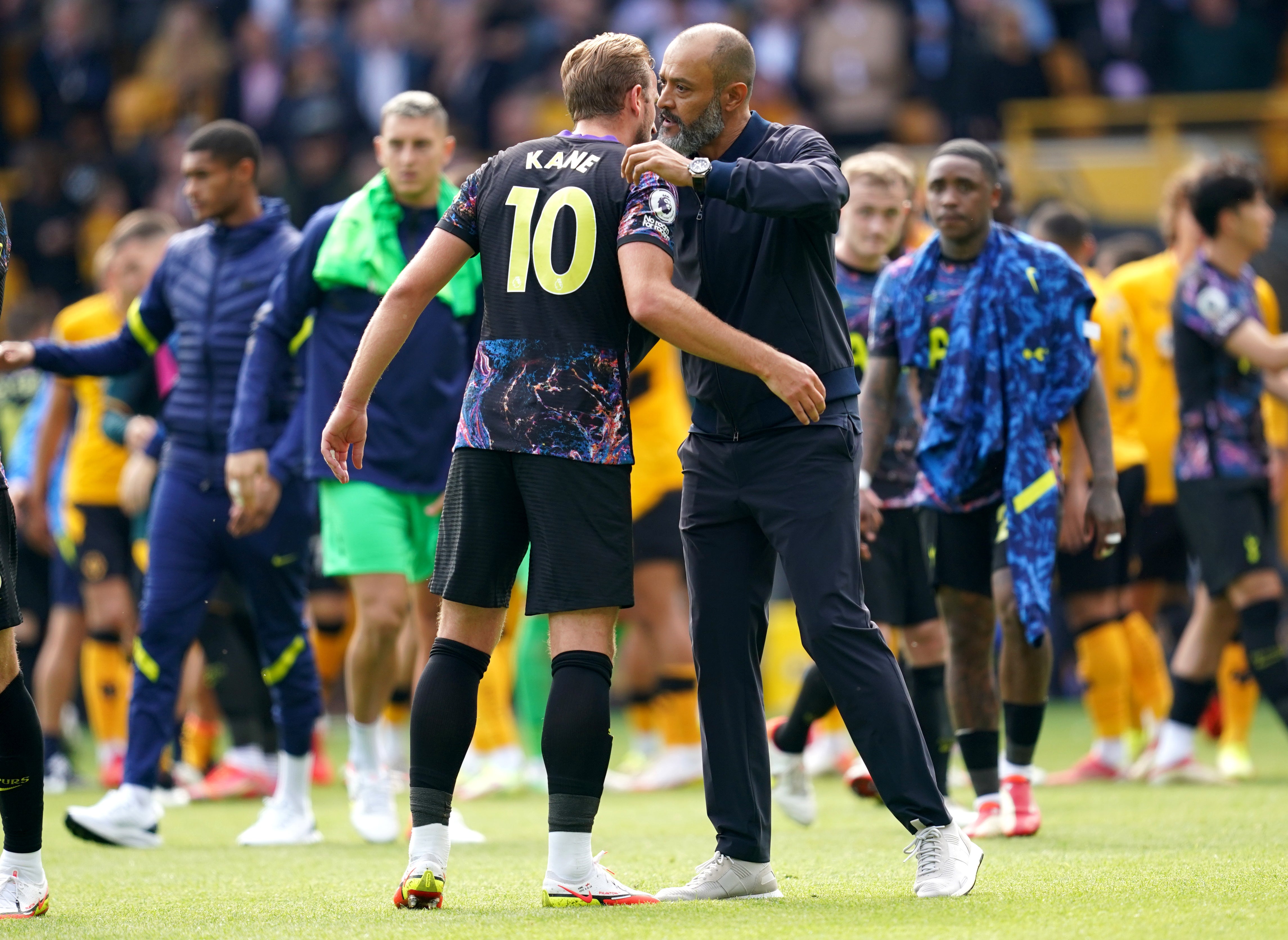 Harry Kane, left, hugs his then manager at Tottenham, Nuno Espirito Santo (PA)
