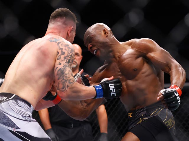 <p>Kamaru Usman (right) retained his title against Colby Covington again</p>