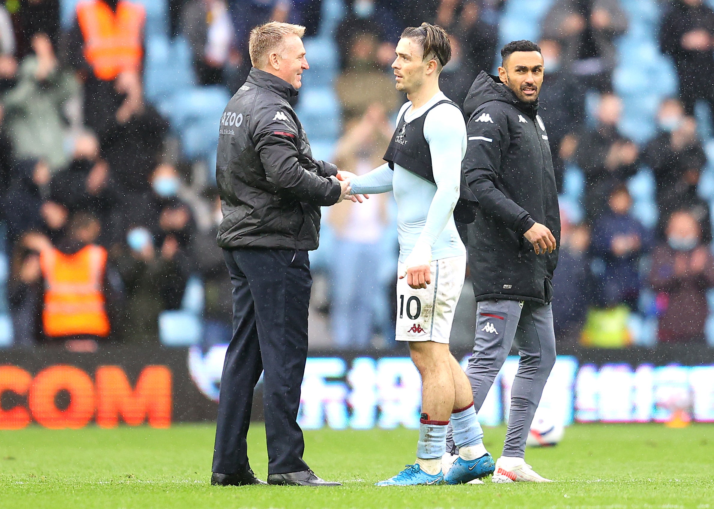 Dean Smith (left) and Jack Grealish shake hands (Richard Heathcote/PA)