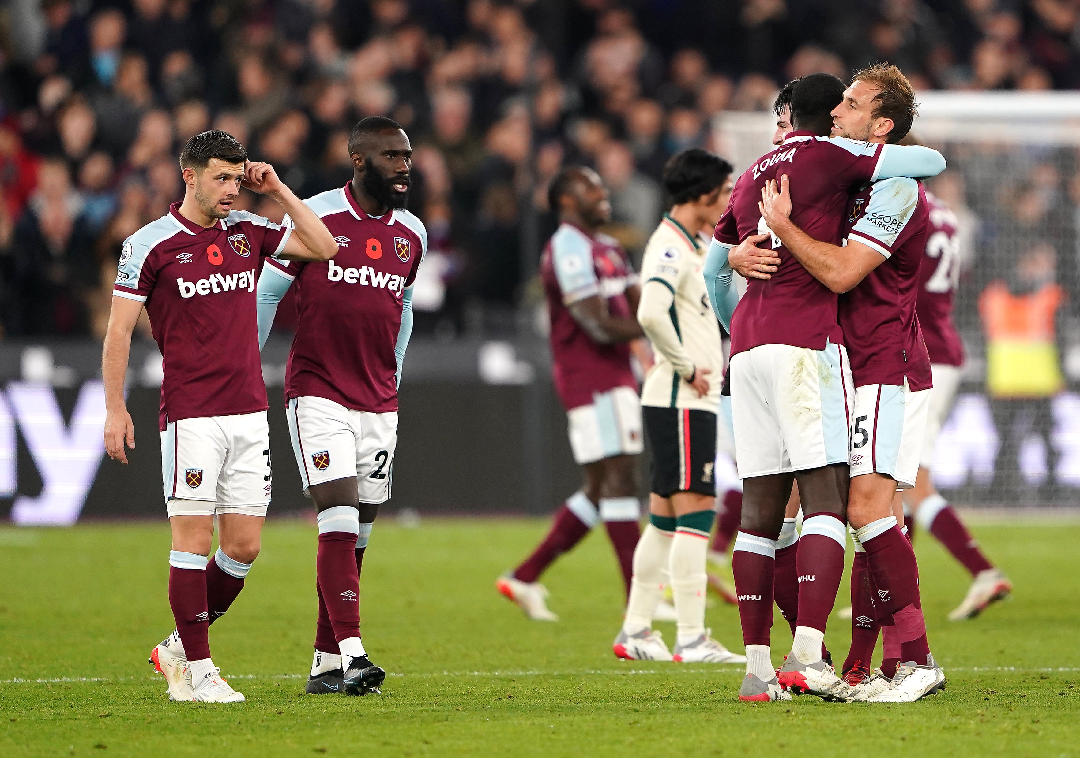 West Ham players celebrate at the final whistle (Zac Goodwin/PA)