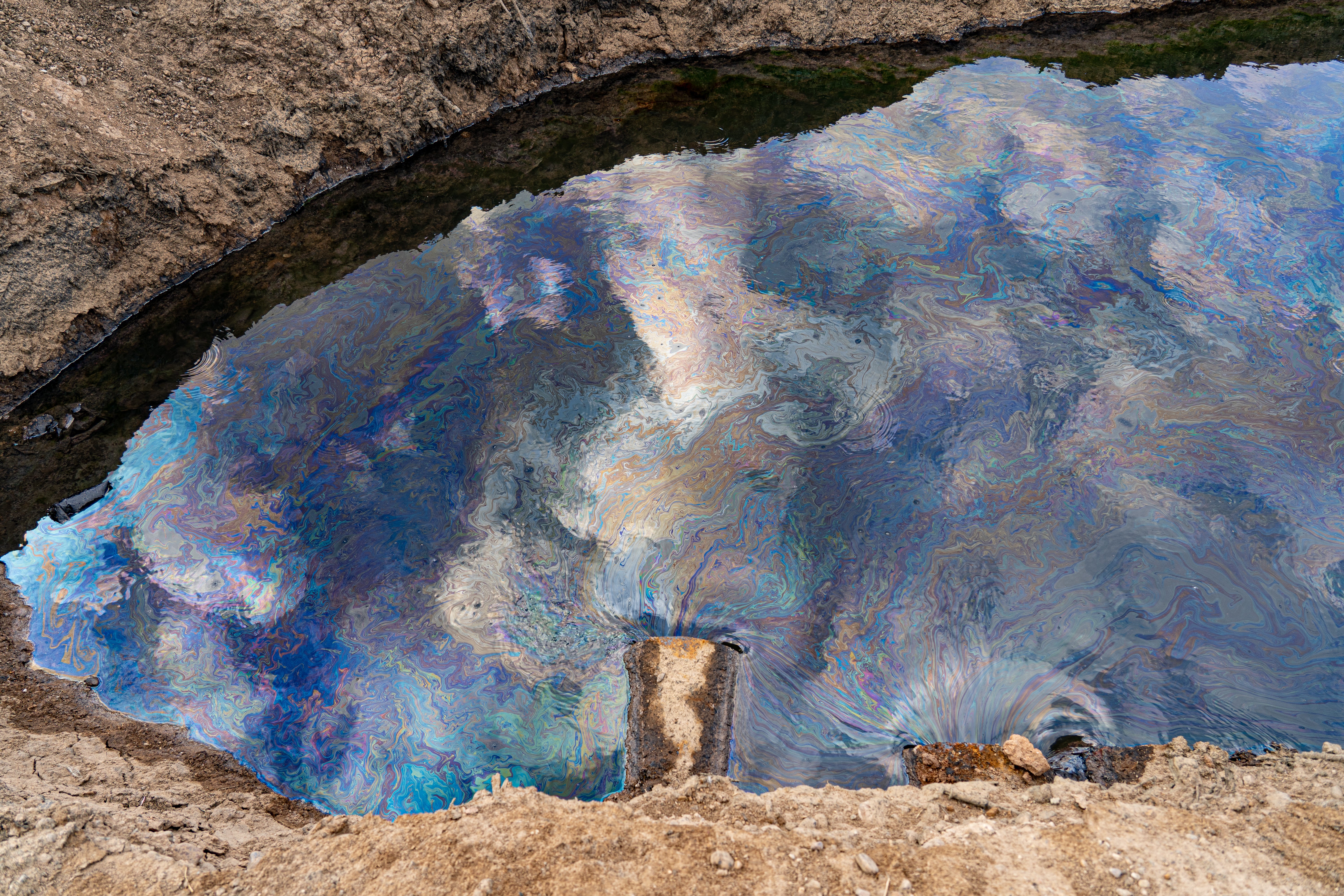 The oil-choked river at Kharab Abu Ghalib village where villagers say people are dying