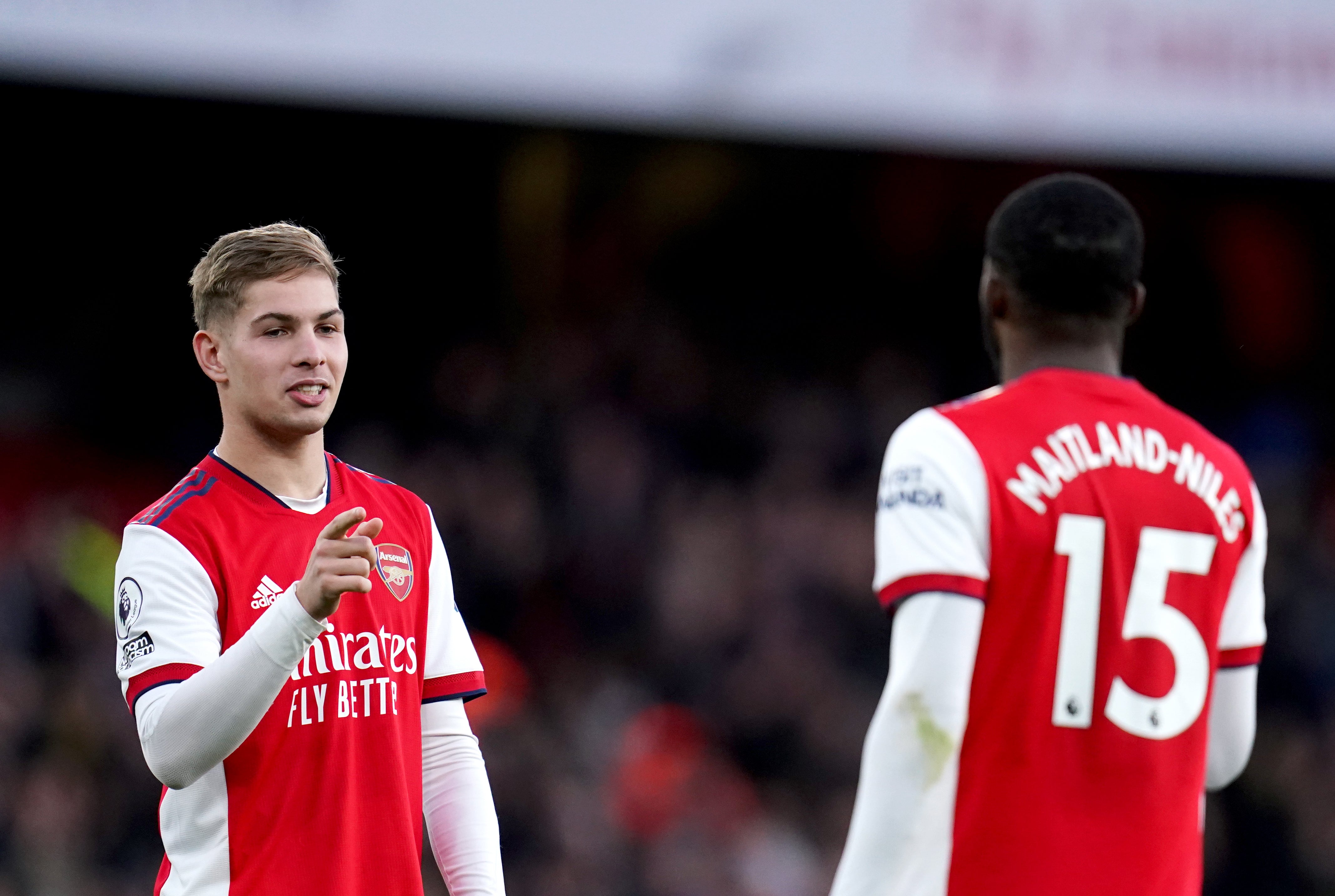 Emile Smith Rowe celebrates victory with Ainsley Maitland-Niles (John Walton/PA)