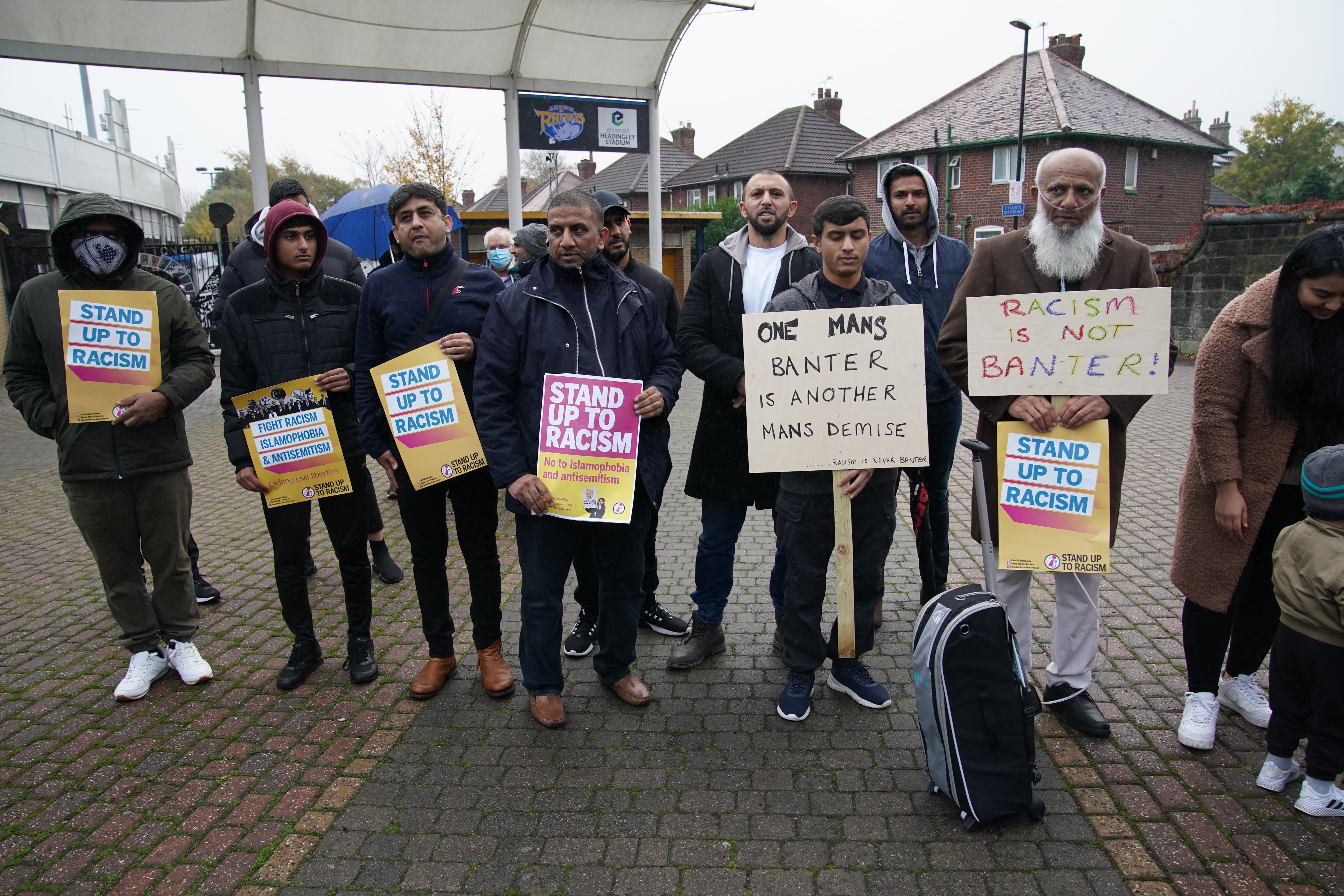 People take part in a protest outside Yorkshire’s stadium Headingley (Peter Byrne/PA)