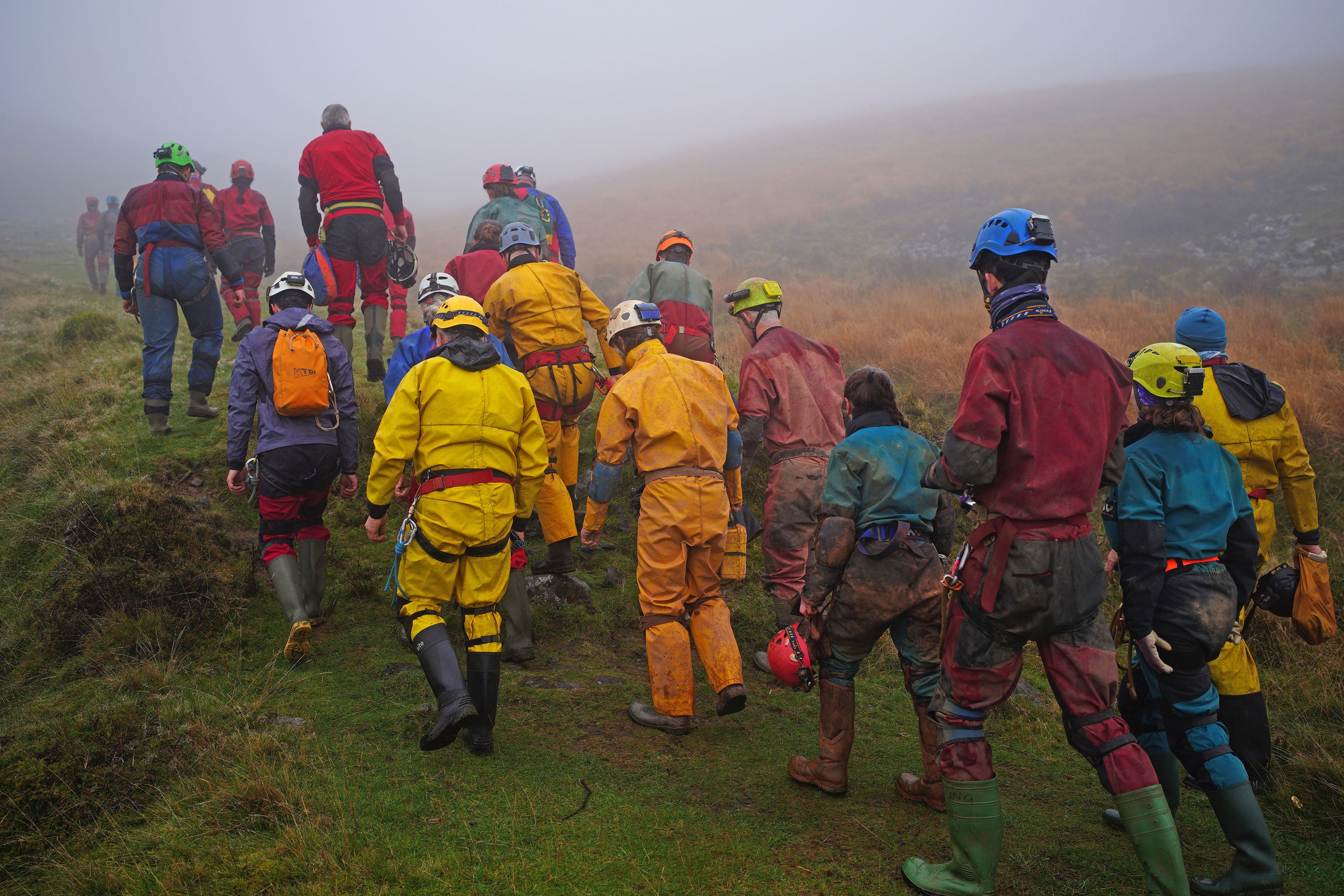 Rescuers took turns doing 12-hour shifts to help get the injured man out of the cave system