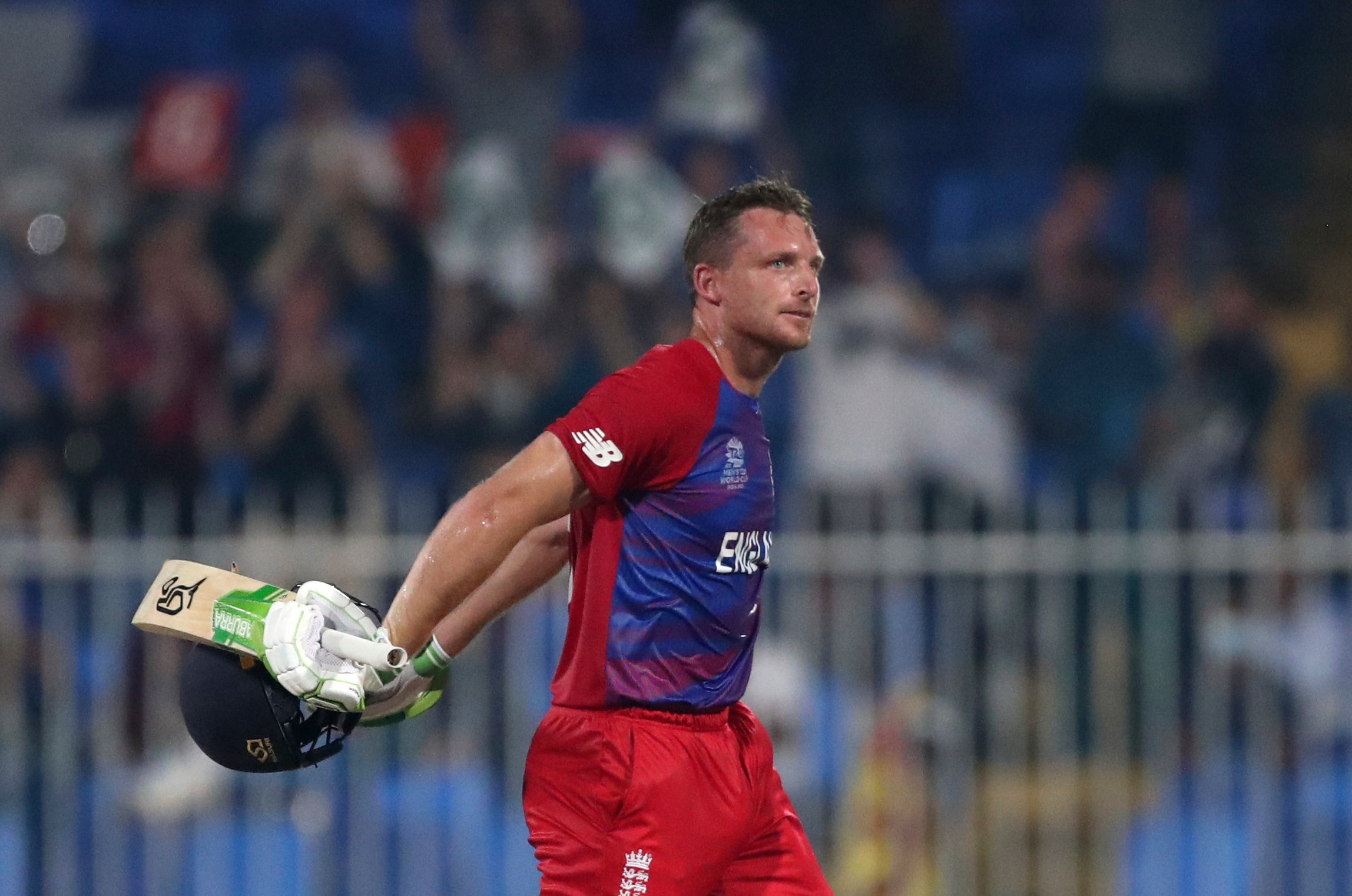 Jos Buttler celebrates the only century of the T20 World Cup to date (Aijaz Rahi/AP)