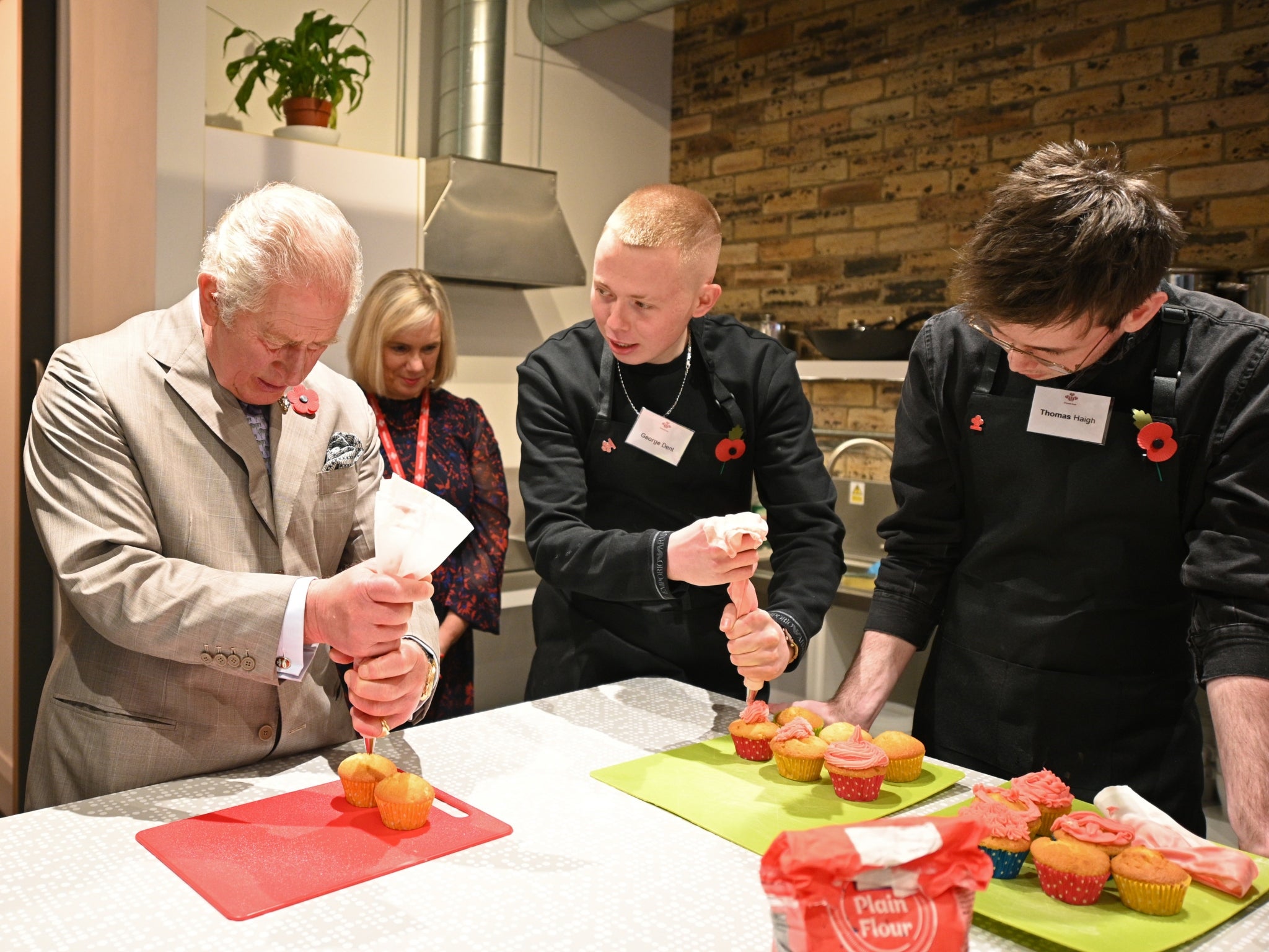 The Prince of Wales iced a cupcake during his visit to Newcastle