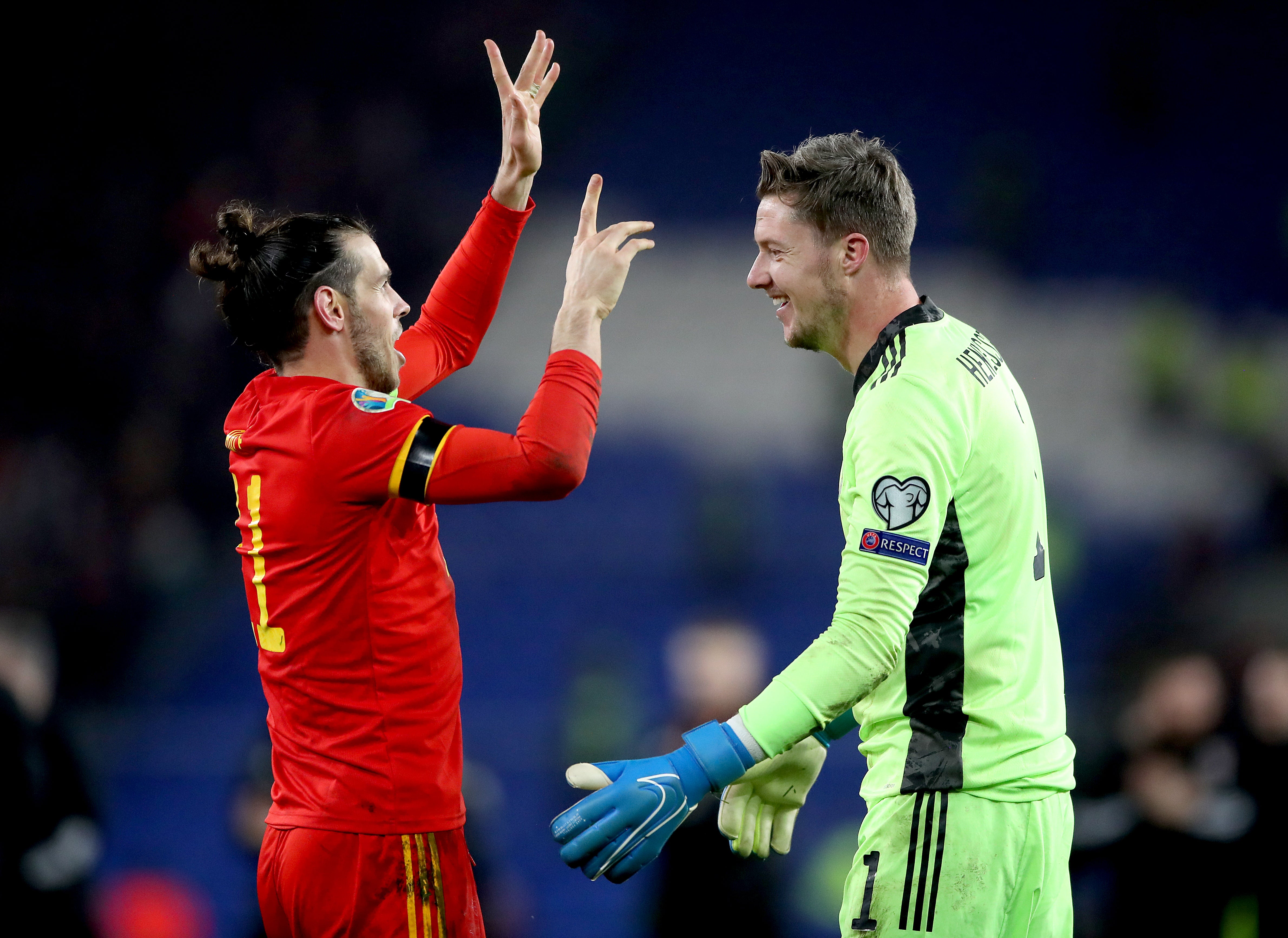 Gareth Bale (left) and Wayne Hennessey (right) have spent almost their entire Wales careers together (Nick Potts/PA)