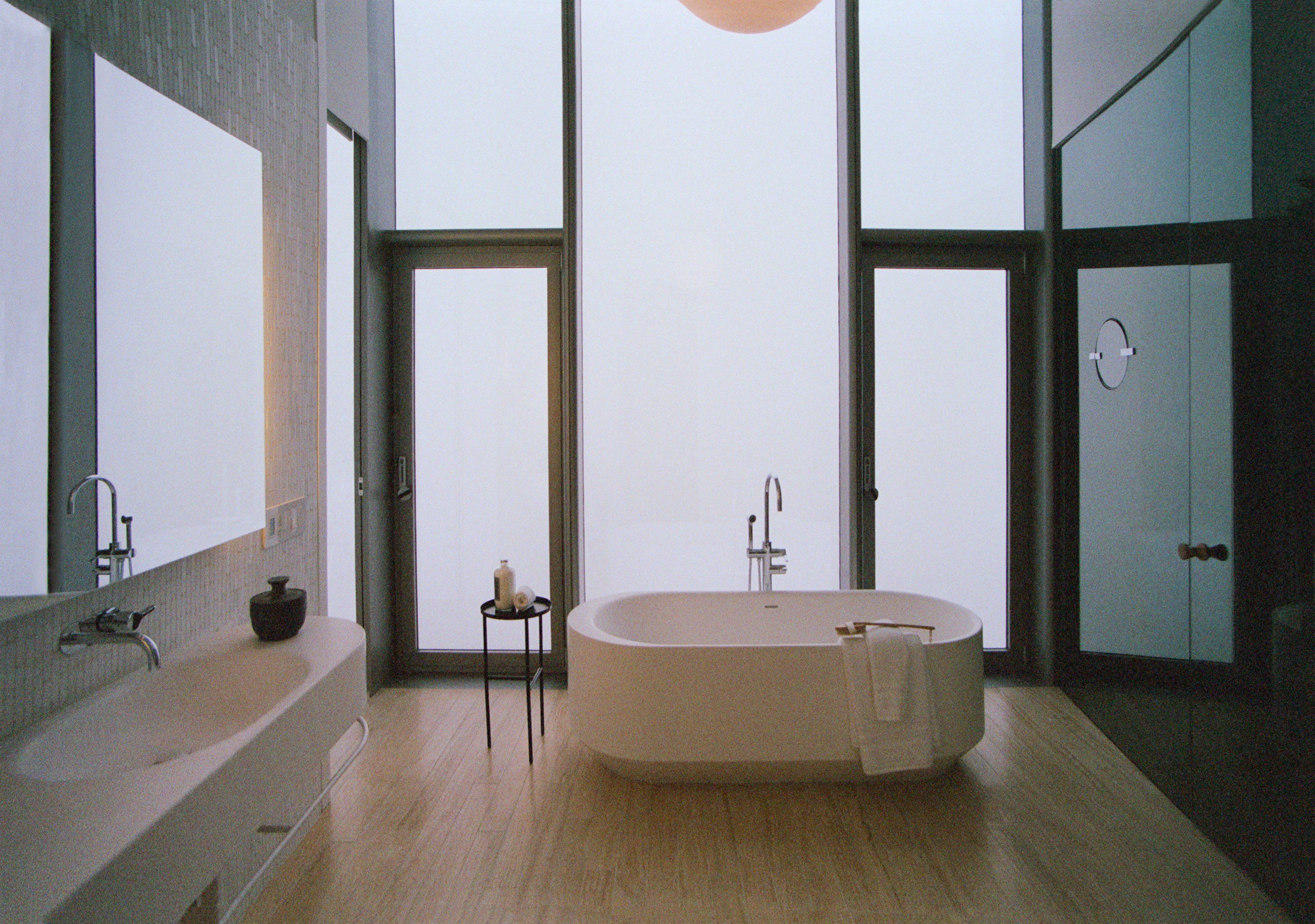 Clouded northern view from one of the staged penthouse bathrooms at Herzog & de Meuron’s 56 Leonard.