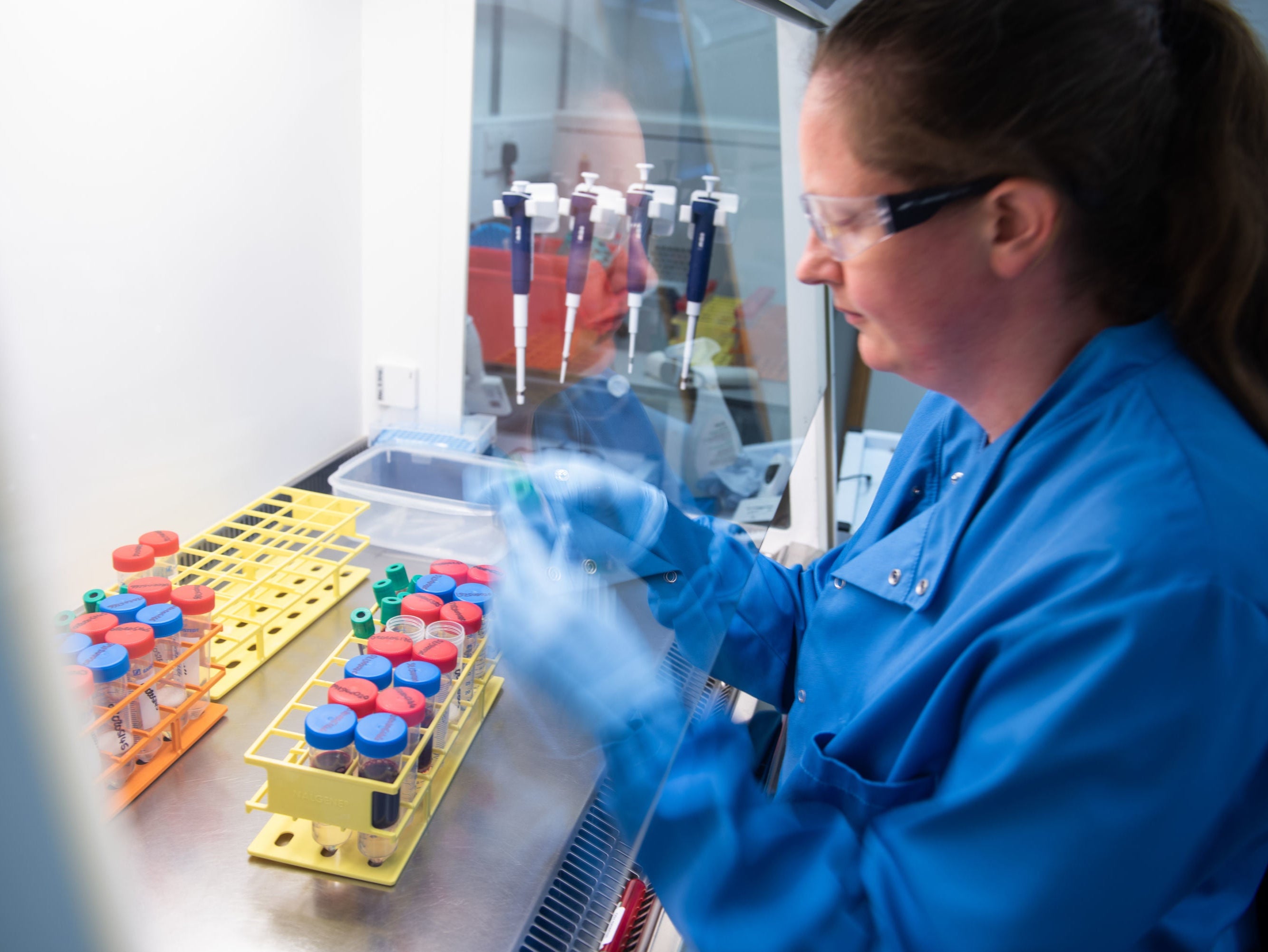 A scientist at the University of Oxford works on an Ebola vaccine about to enter clinical trials