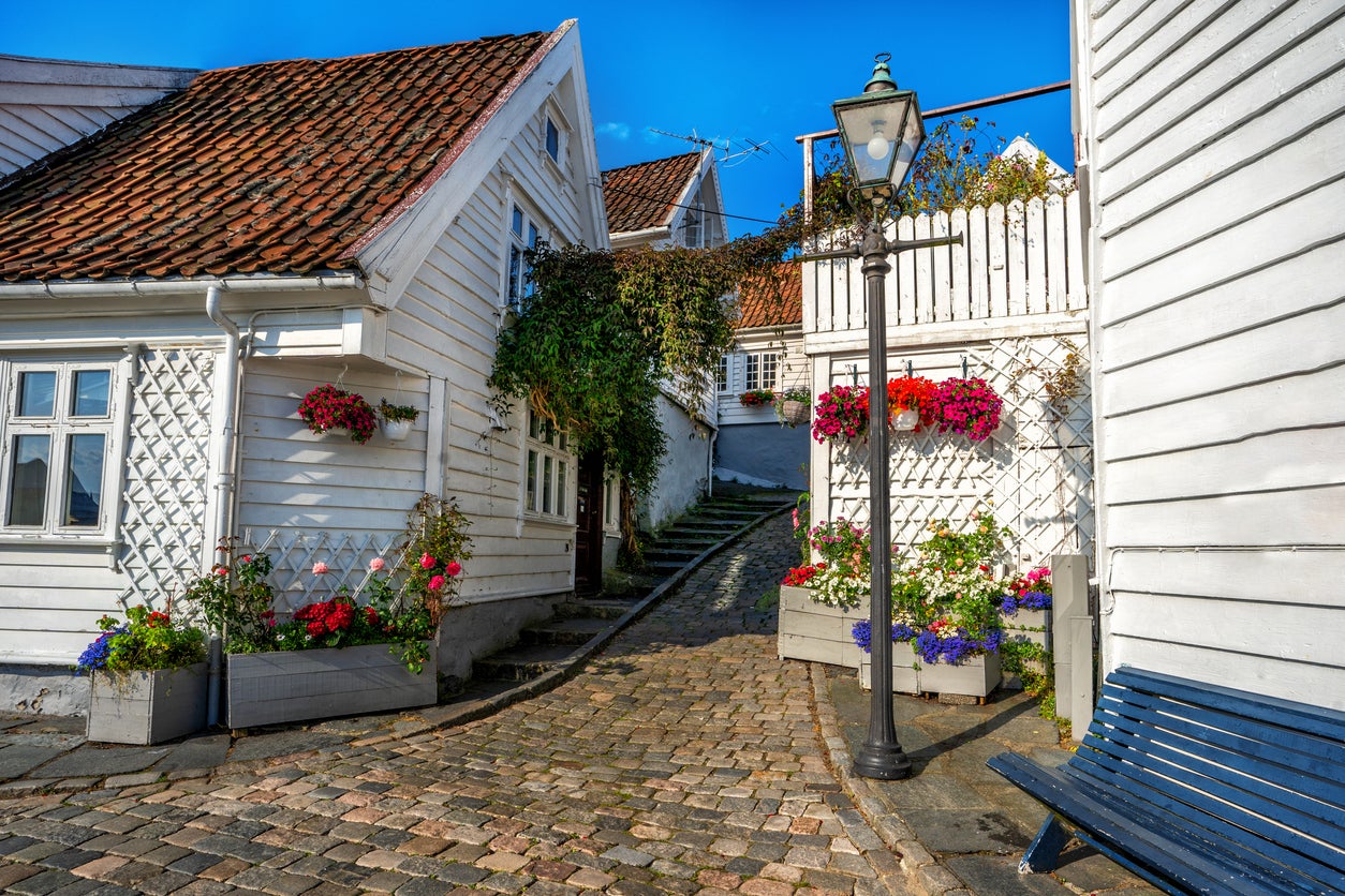 Street with traditional white wooden houses in Gamle Stavanger