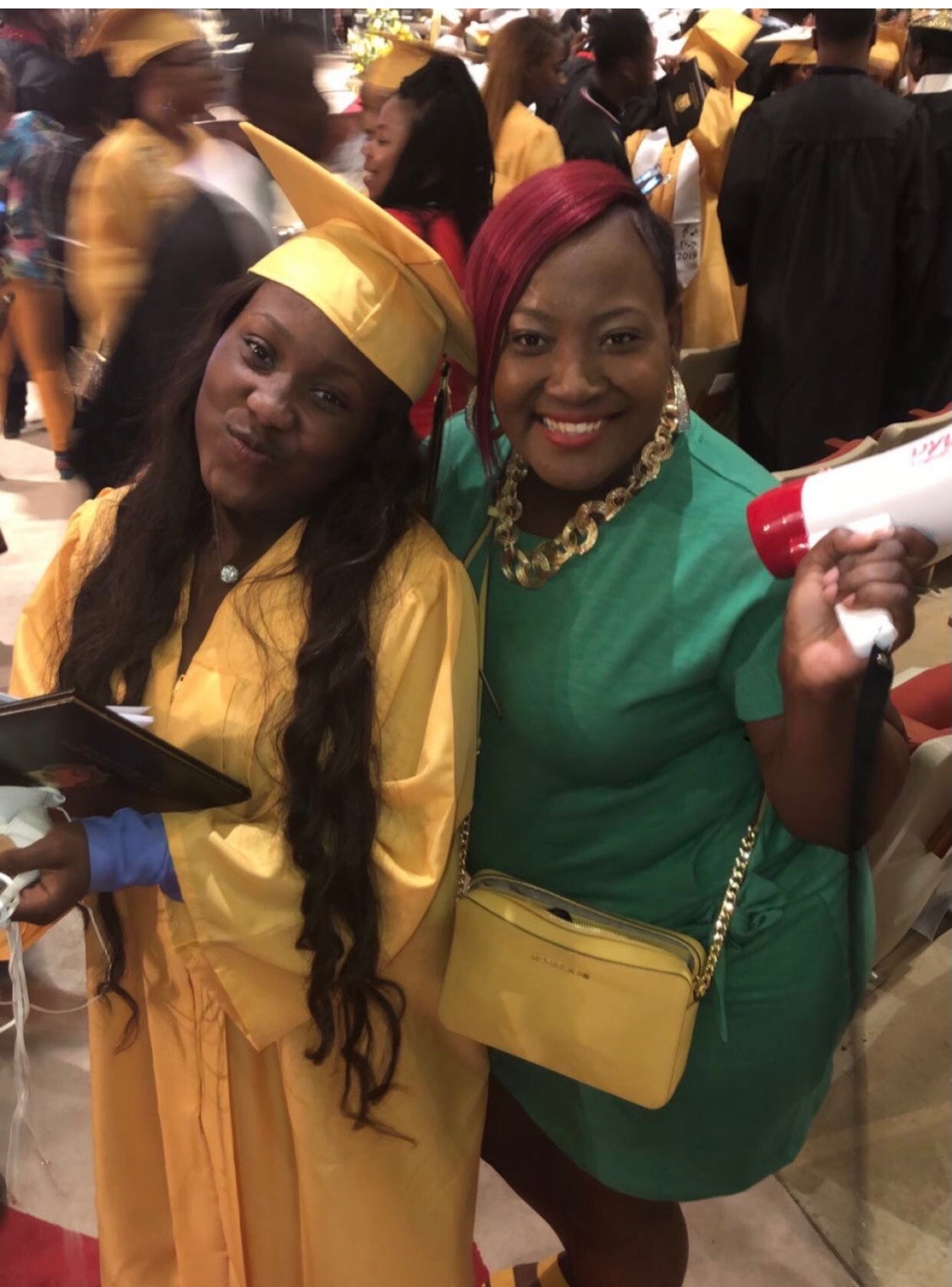 Jaya Beemon at her high school graduation, with ‘warrior mom’ Nyisha