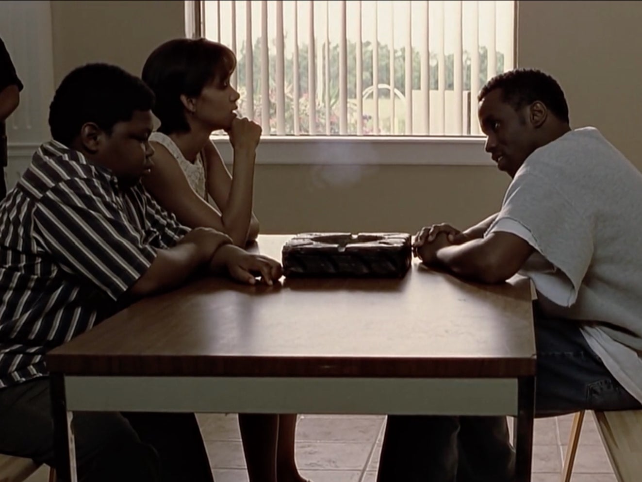Coronji Calhoun Sr alongside Halle Berry and Sean ‘Diddy’ Combs in 2001 film ‘Monsters Ball’